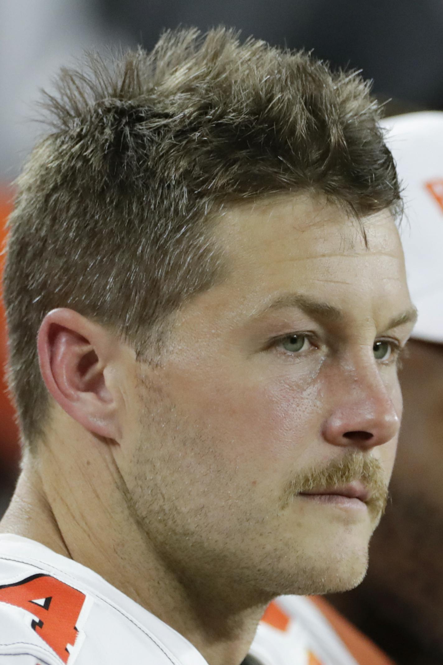 Cleveland Browns punter Britton Colquitt (4) sits on the sideline against the Washington Redskins during the first half of an NFL preseason football game, Thursday, Aug. 8, 2019, in Cleveland. (AP Photo/Ron Schwane) ORG XMIT: OHTD10