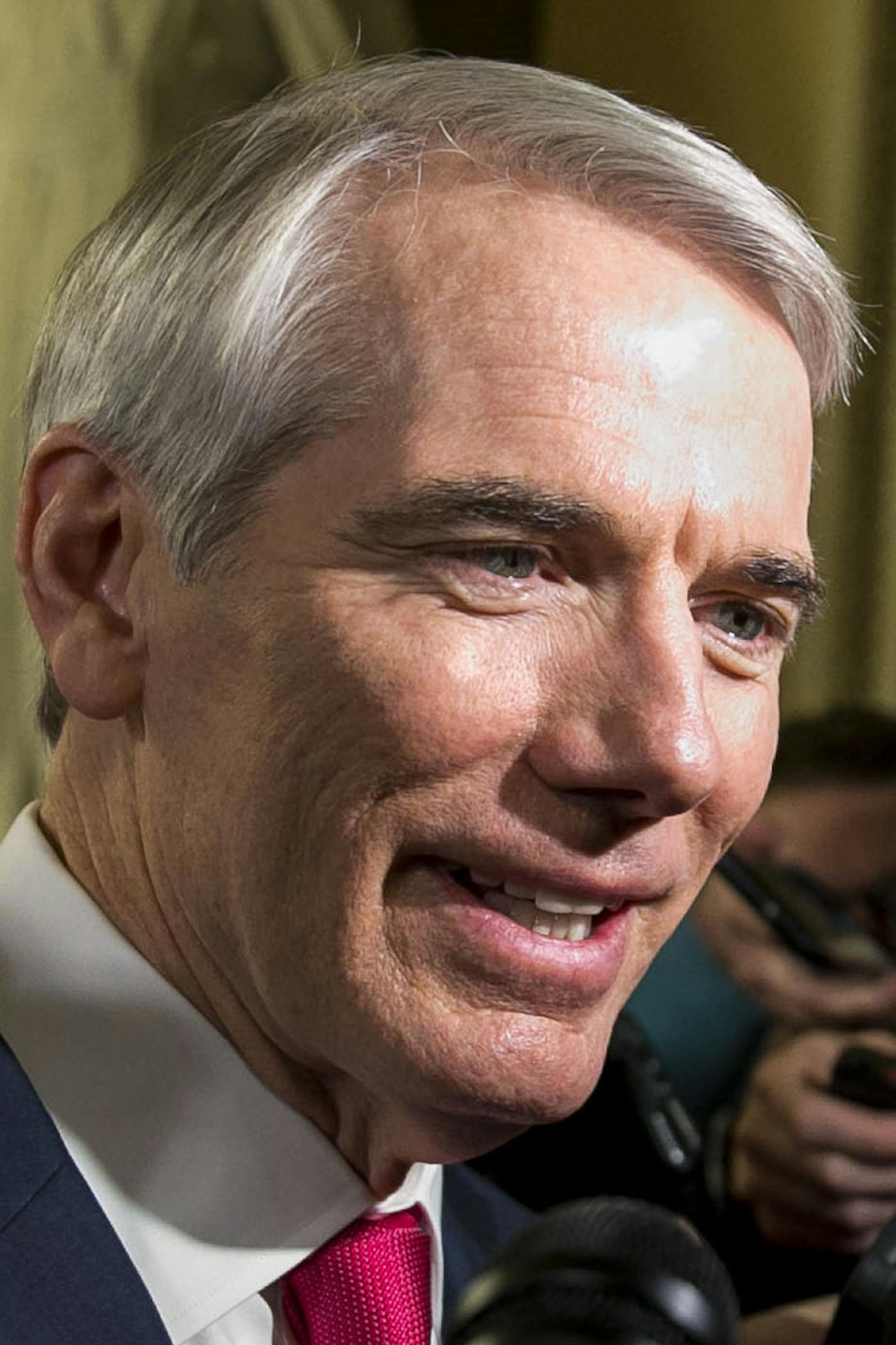 Sen. Rob Portman (R-Ohio) discusses efforts to merge the House and Senate tax bills, on Capitol Hill in Washington on Friday, Dec. 15, 2017. Republican lawmakers agreed on Friday to expand the child care tax credit so that it benefits more low-income Americans, a move intended to win back the support of Senator Marco Rubio of Florida.Sen. Marco Rubio (R-Fla.). (Al Drago/The New York Times)
