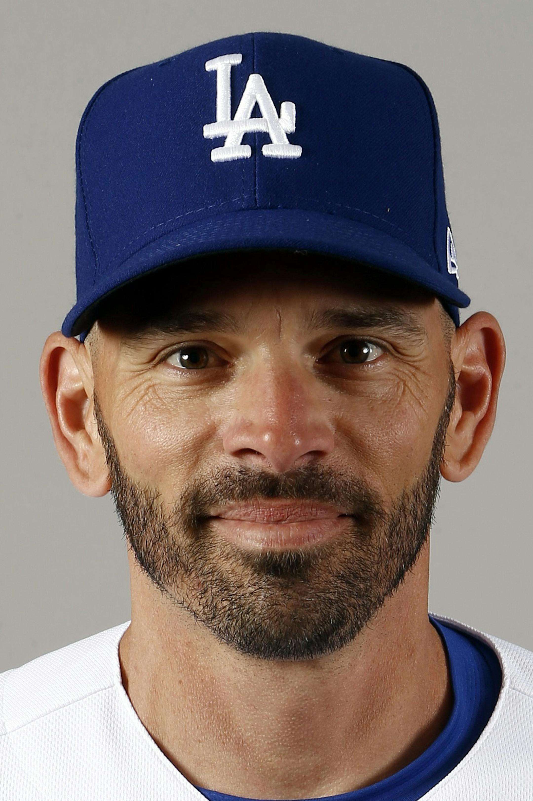 FILE - This is 2018 file photo, shows third base coach Chris Woodward of the Los Angeles Dodgers baseball team in Glendale, Ariz. The Texas Rangers have hired Dodgers third base coach Chris Woodward as their manager, six weeks after Jeff Banister was fired. (AP Photo/Ross D. Franklin, File)