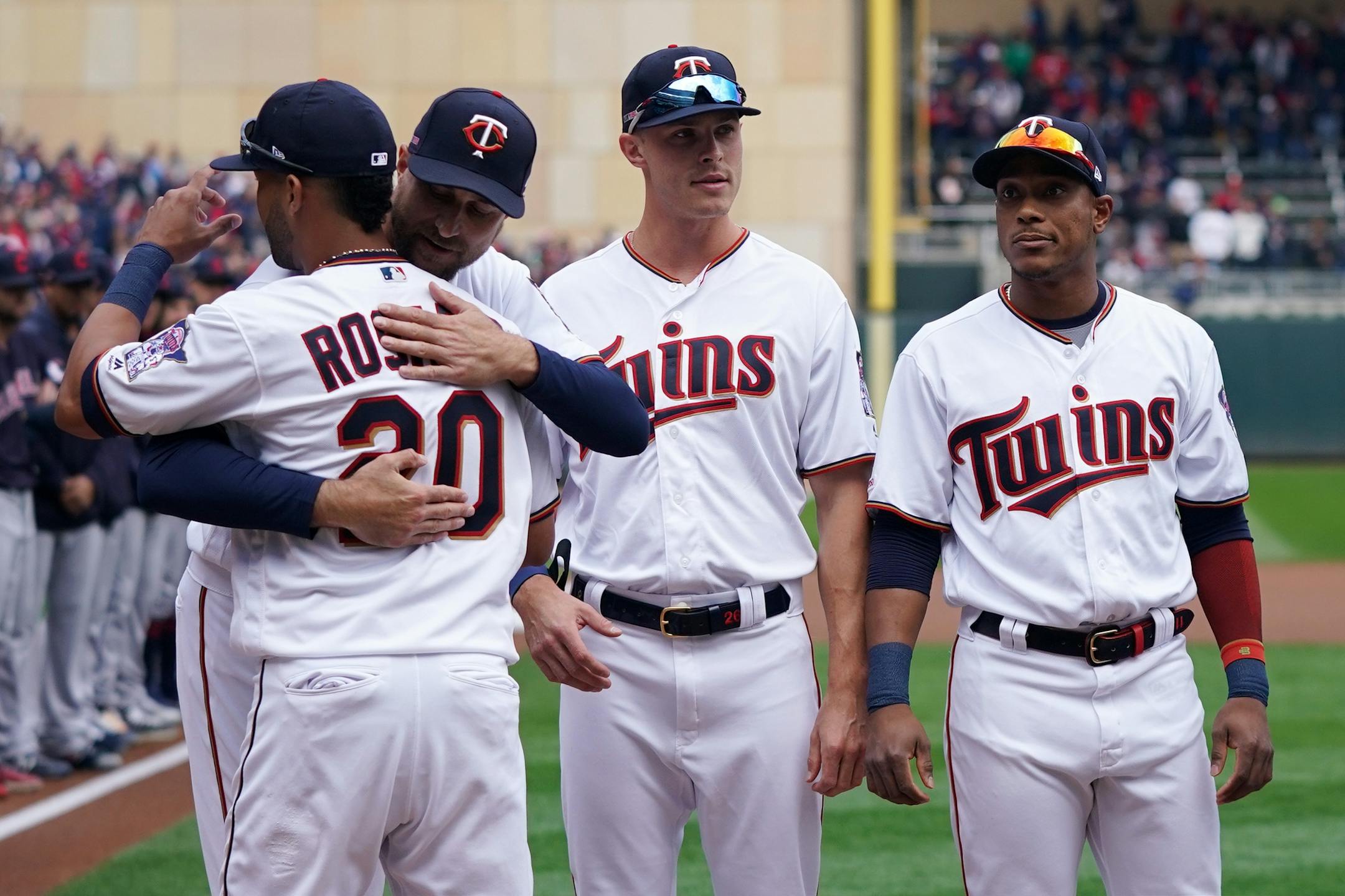 Baldelli hugged Twins outfielder Eddie Rosario on Opening Day.