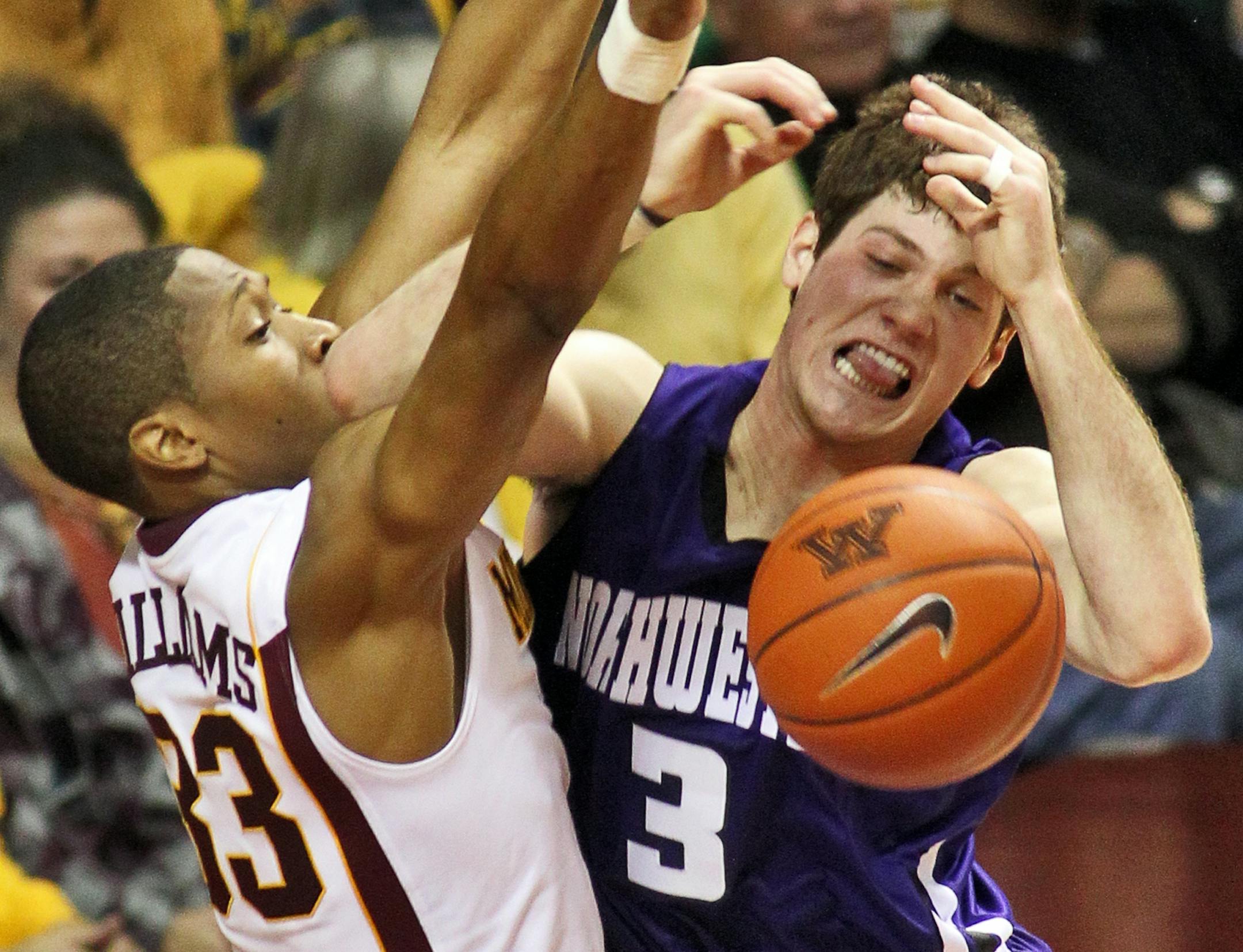 The Gophers' Rodney Williams stopped Northwestern's Dave Sobolewski during Minnesota's 75-52 victory.