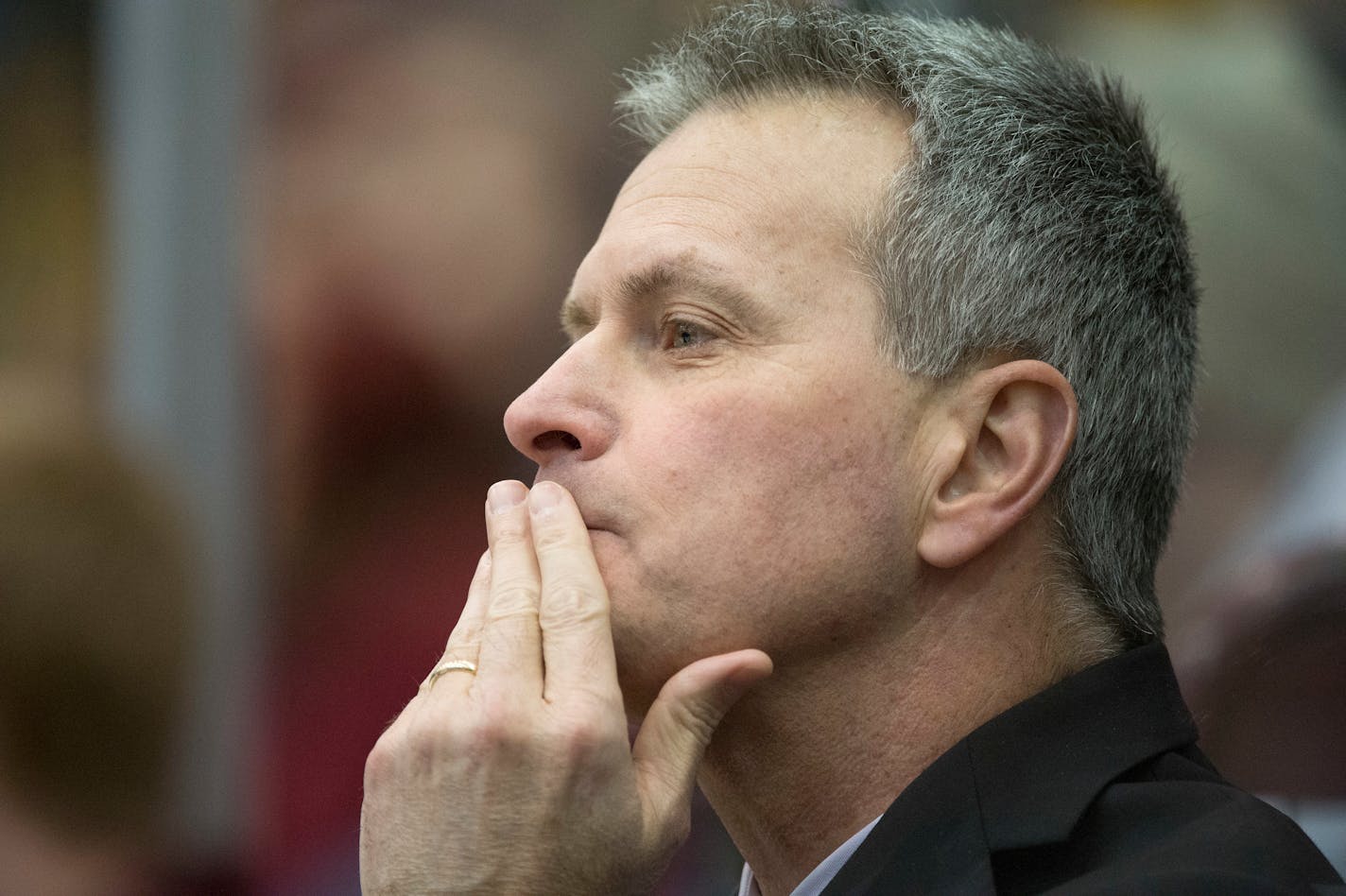 Minnesota Head Coach Don Lucia watches his players as they play against Michigan in the third period on Saturday night. ] (Aaron Lavinsky | StarTribune) Michigan plays against the University of Minnesota on Saturday, Feb. 14, 2015 at Mariucci Arena.