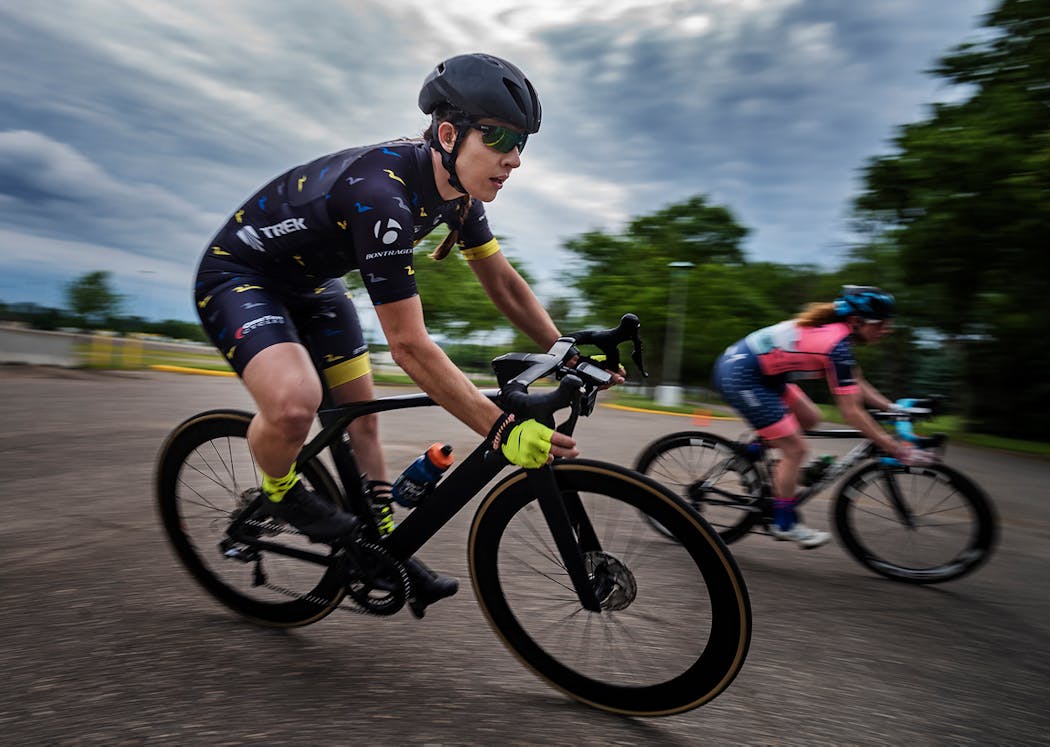 Erin Ayala handled a hairpin turn before an uphill in a criterium at the State Fairgrounds. She took fourth.