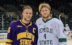 Riese, left, and Will Zmolek got together when Minnesota State Mankato played at Bemidji State earlier this season.