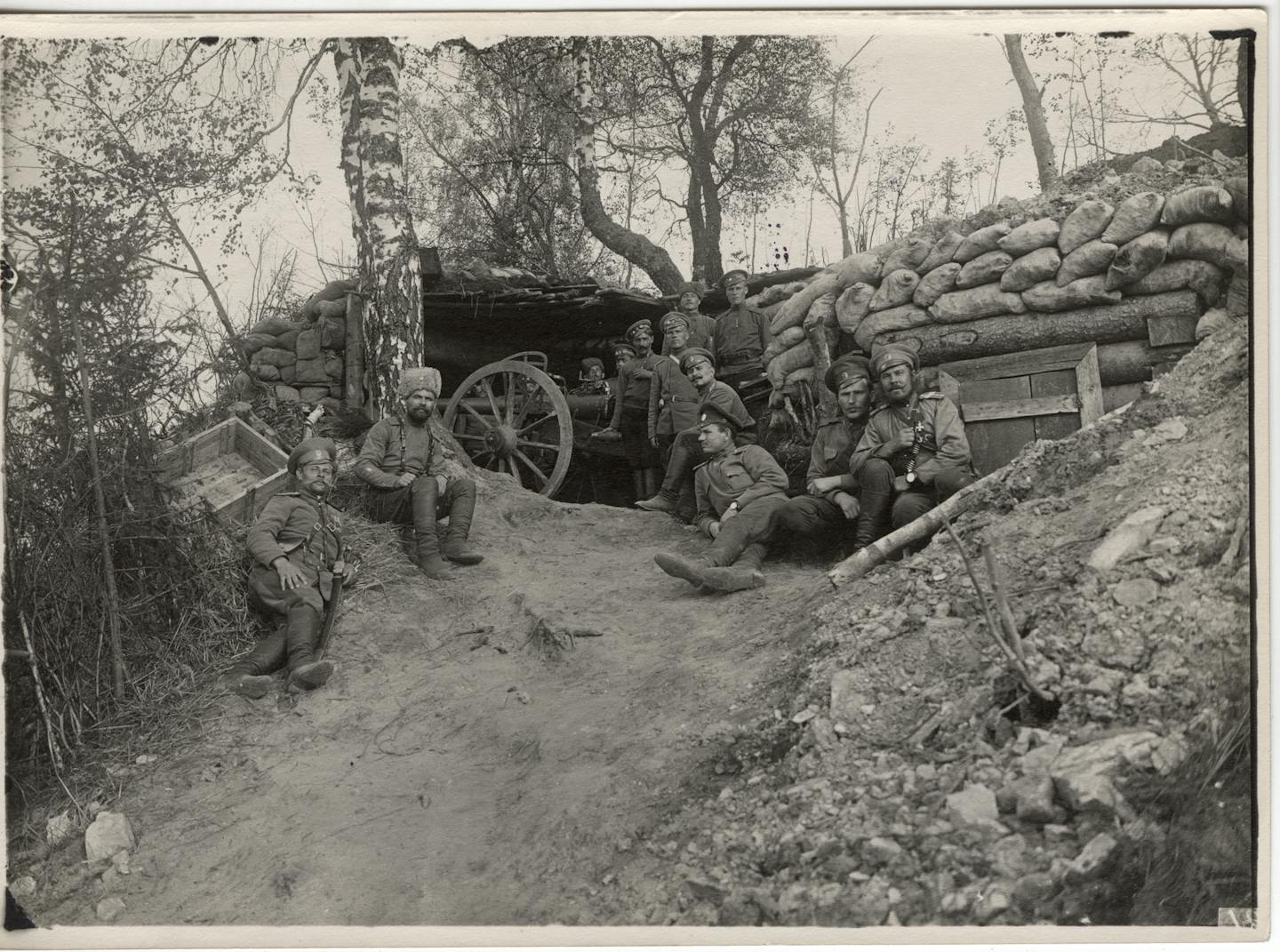 Group of gunners and their cannon in the trenches. Livonia. April 24, 1916 (Photographer V.S. Ivanov) . From "Faces of War" exhibit at the Museum of Russian Art