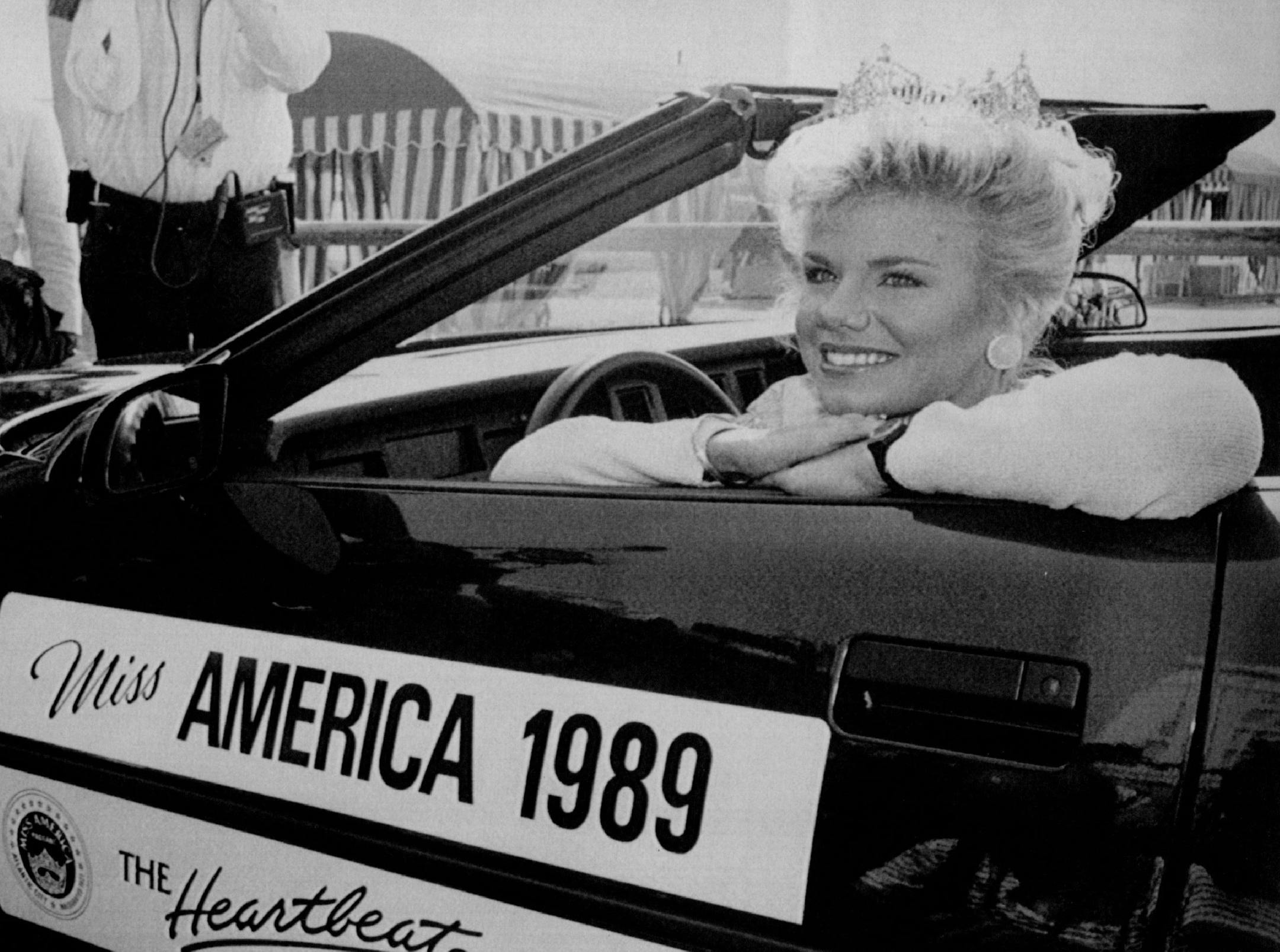 September 11, 1988 JOHN CROFT - Miss America, Gretchen Carlson of Anoka, Minn. poses in the front seat of a car she gets to use during her reign The photo was taken Sunday on the Boardwalk in Atlantic City. Mike Derer; John Croft, AP Laserphoto; Minneapolis Star Tribune