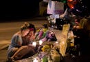 Visitors at a roadside memorial in July near where Philando Castile was shot and killed by a police officer. The officer, Jeronimo Yanez of the St. An