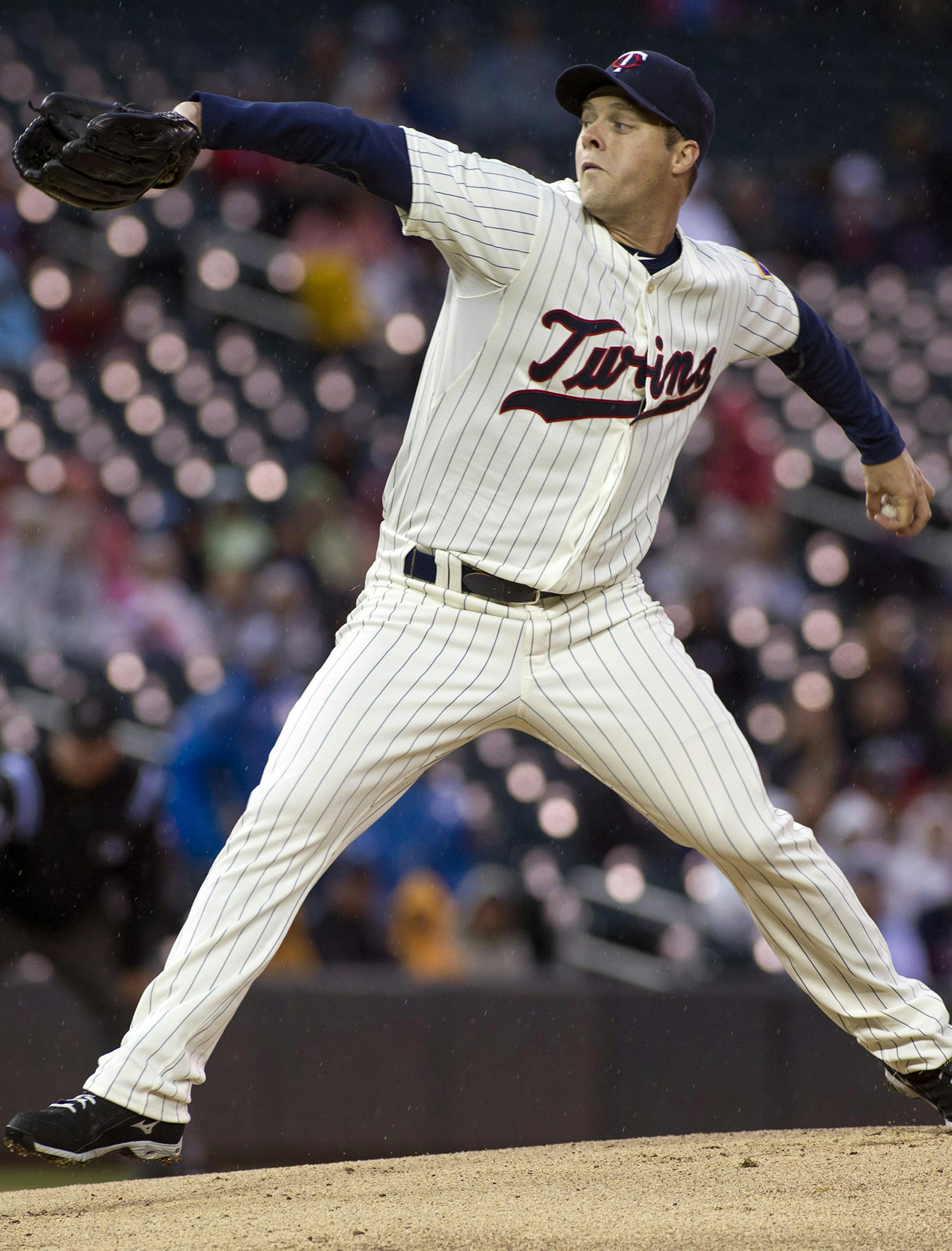 Minnesota Twins starting pitcher Andrew Albers delivers during the first inning of a baseball game against the Tampa Bay Rays, Saturday, Sept. 14, 2013, in Minneapolis. (AP Photo/Paul Battaglia)