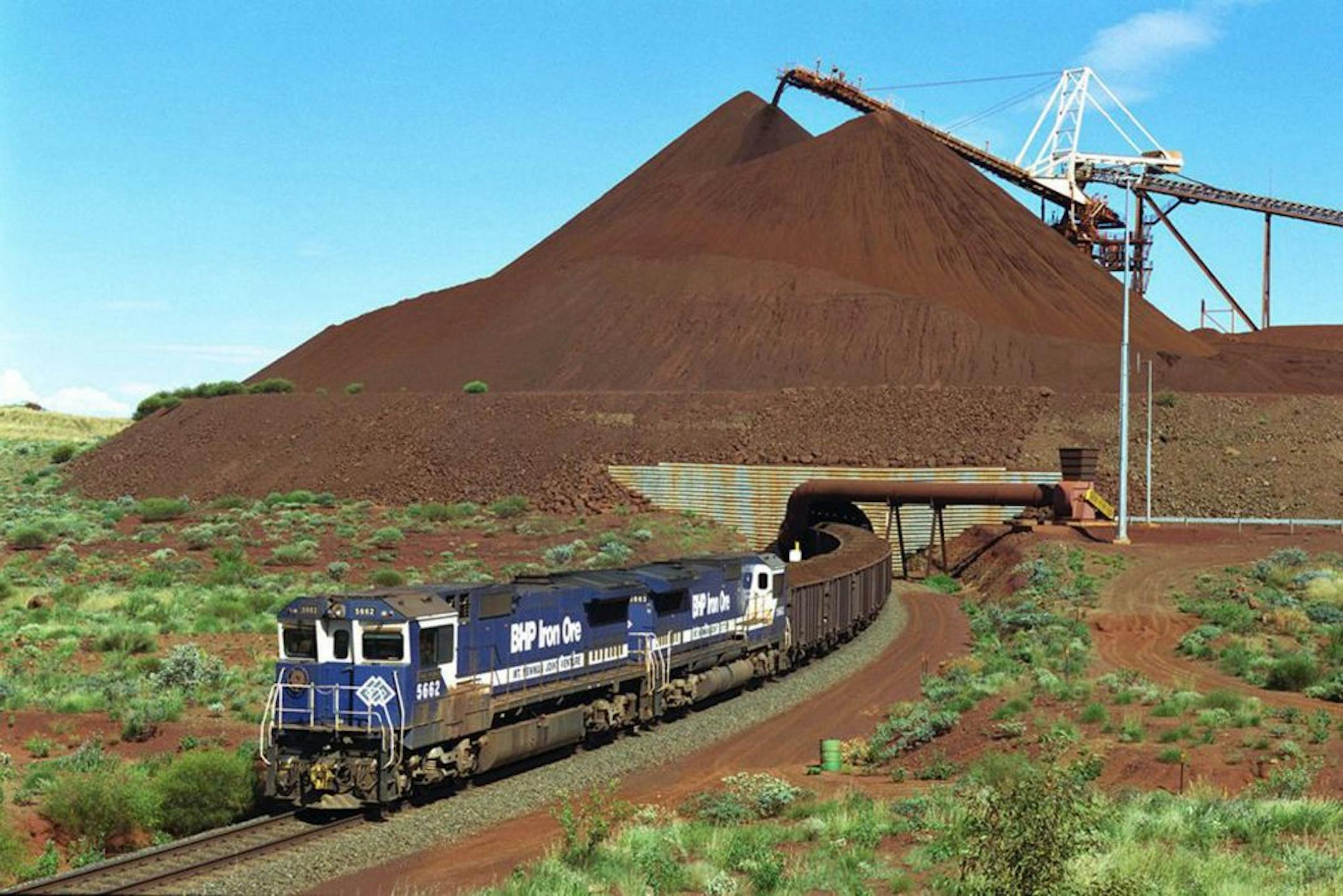 A train loaded with iron ore departed the Yandi mine in Pilbara, Western Australia. The world's biggest mining group, BHP Billiton, owns the mine.