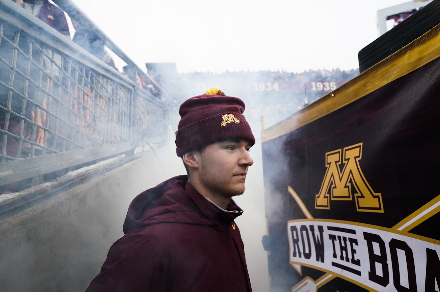 Minnesota Gophers punter Casey O'Brien (14) watched his team take the field. O'Brien is undergoing cancer treatment. ] MARK VANCLEAVE ¥ The Wisconsin Badgers played the Minnesota Gophers at TCF Bank Stadium on Saturday, Nov. 30,2019 in Minneapolis.