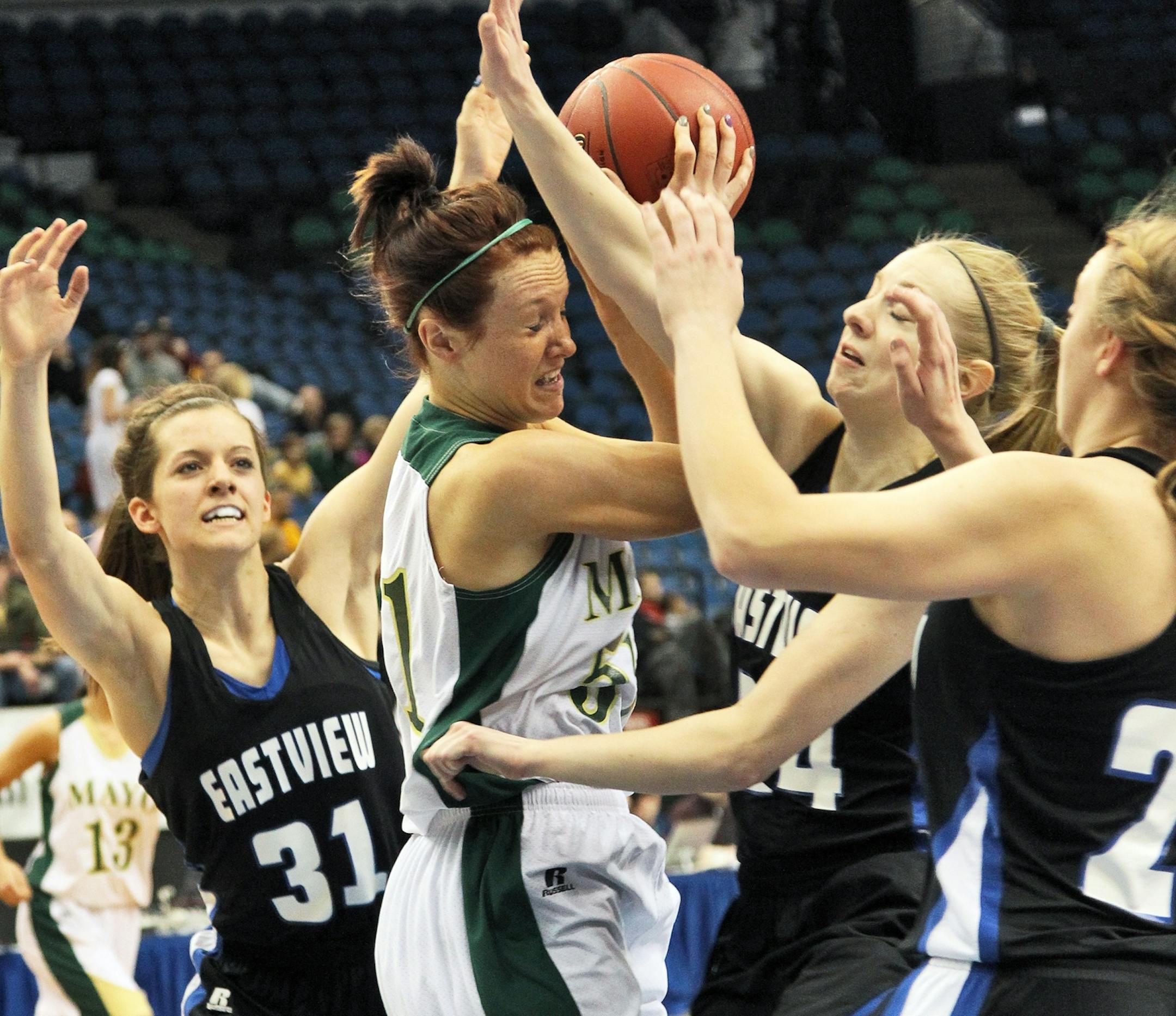 GIRLS BASKETBALL STATE QUARTERFINALS. Rochester Mayo vs. Eastview. Eastview defense put the squeeze on Mayo's Rachael Doll as she went up for a shot. (MARLIN LEVISON/STARTRIBUNE(mlevison@startribune.com