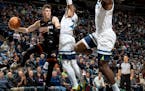 Tyler Herro (14) of the Miami Heat passes the ball during the fourth quarter against the Minnesota Timberwolves on Sunday, Oct. 27, 2019 at Target Cen