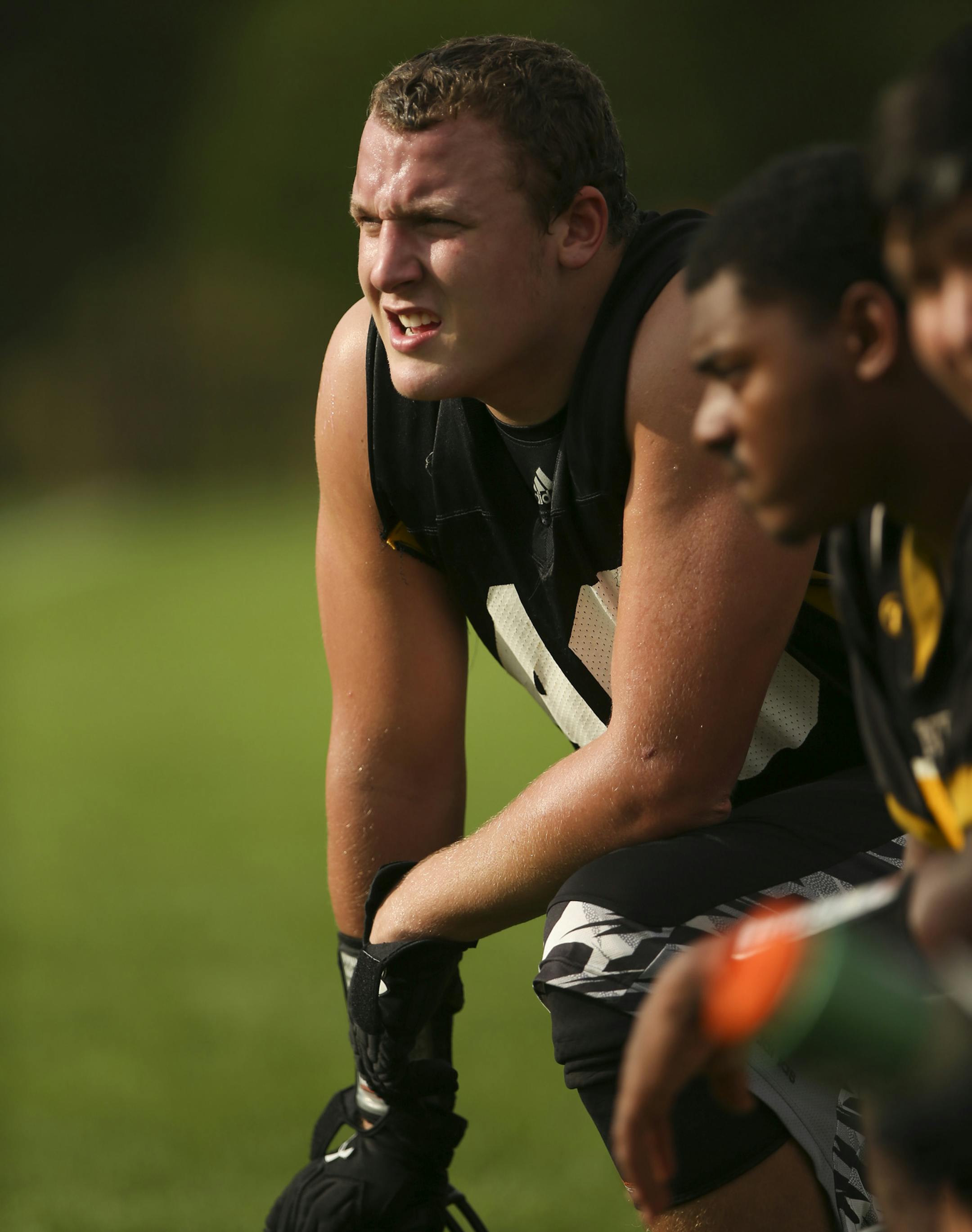 DeLaSalle lineman Drayton Carlberg on the sidelines at practice after school Thursday. ] JEFF WHEELER ‚Ä¢ jeff.wheeler@startribune.com DeLaSalle lineman Drayton Carlberg is one of Minnesota's most highly recruited seniors. The Islanders held a walk through practice Thursday afternoon, September 4, 2014 at their home field on Nicollet Island.