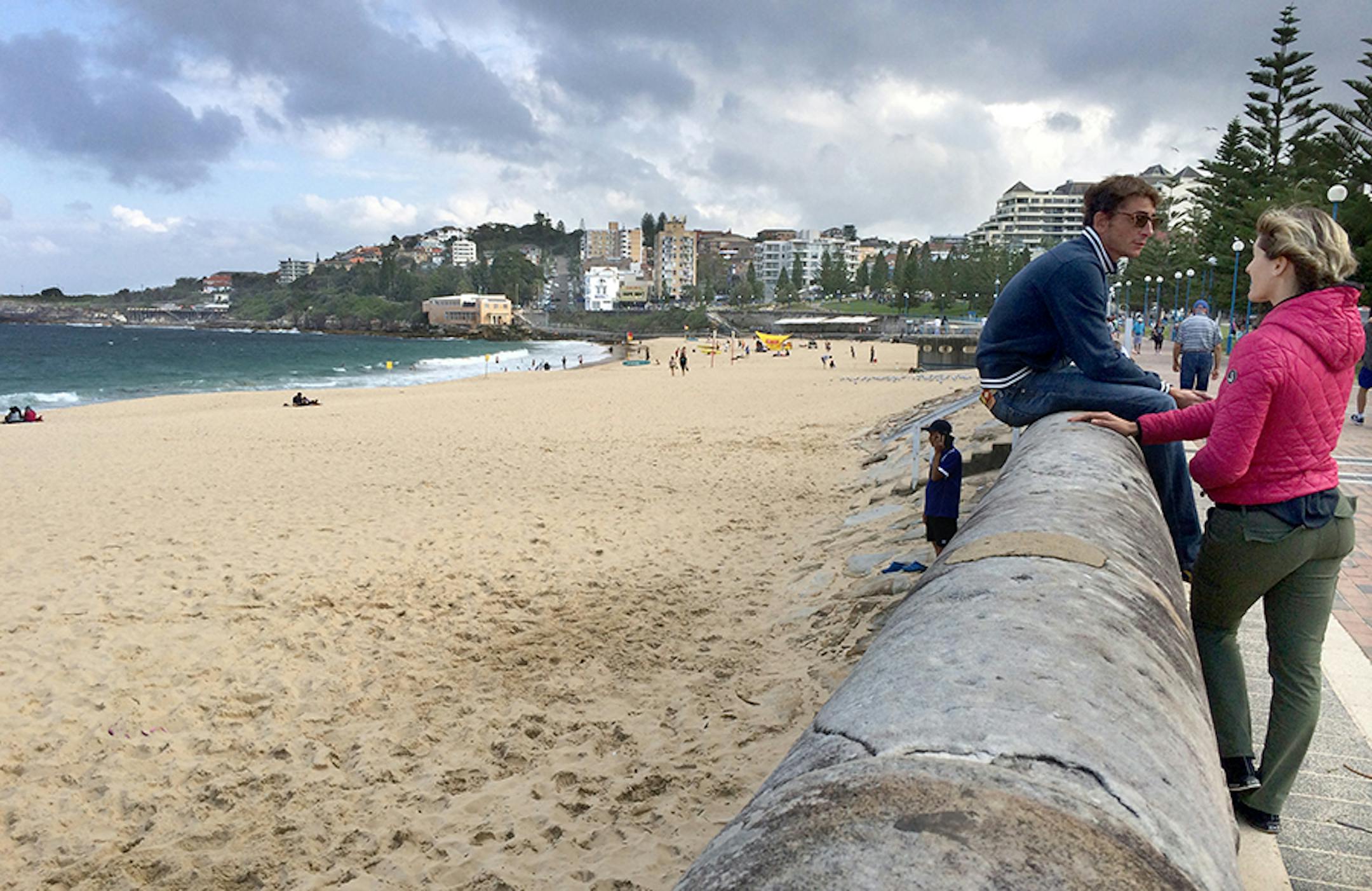 A young couple chats along the wall spanning the length of Coogee Beach. ] Travel story on coastal beaches in Australia Star Tribune photos by Rochelle Olson