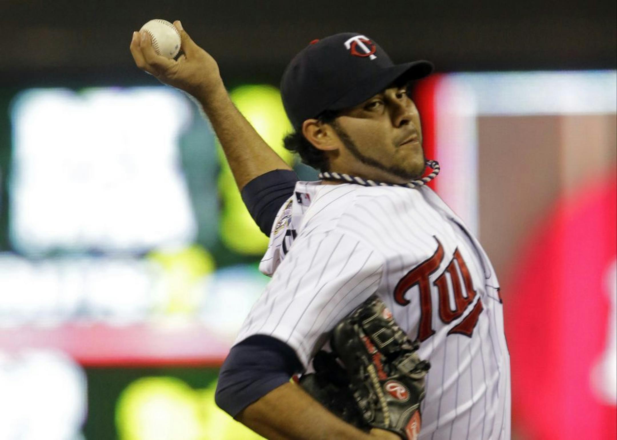 Minnesota Twins pitcher Pedro Hernandez throws against the Cleveland Indians in the first inning of a baseball game, Friday, Sept. 27, 2013, in Minneapolis.