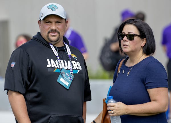 Assistant tight ends coach for the Jacksonville Jaguars Tony Sparano Jr. spoke with his mother Jeanette Sparano before a joint practice with the Minne