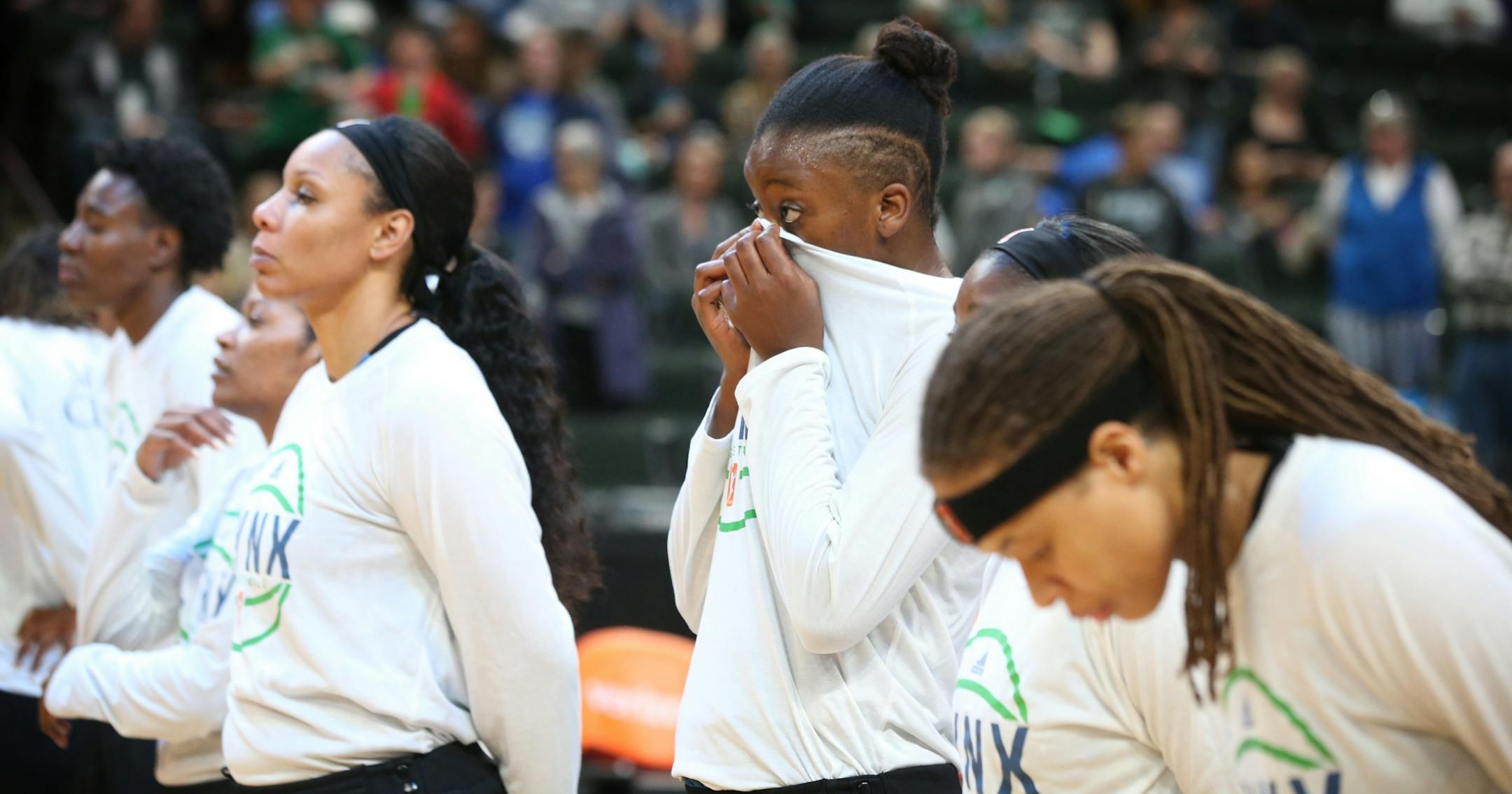 Minnesota Lynx forward Temi Fagbenle (14) covered her eyes during a moment of silence for the bomb victims in England at Xcel Energy Center May 22, 2017 in St. Paul, MN.