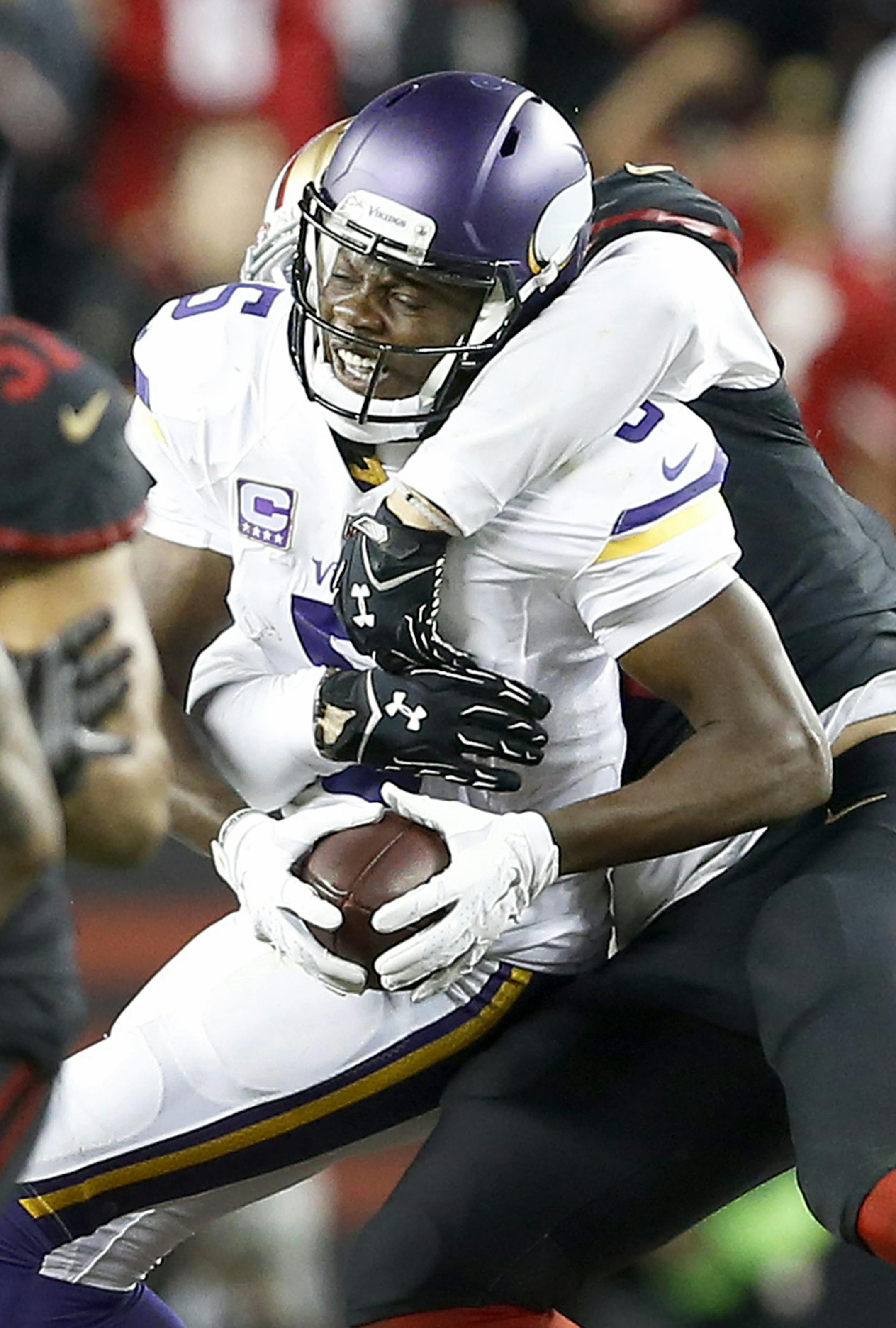 Minnesota Vikings quarterback Teddy Bridgewater (5) was sacked by Aaron Lynch (59) in the fourth quarter. ] CARLOS GONZALEZ cgonzalez@startribune.com - September 14, 2015, Levi's Stadium, Santa Clara, CA, NFL, Minnesota Vikings vs. San Francisco 49ers, Monday Night Football