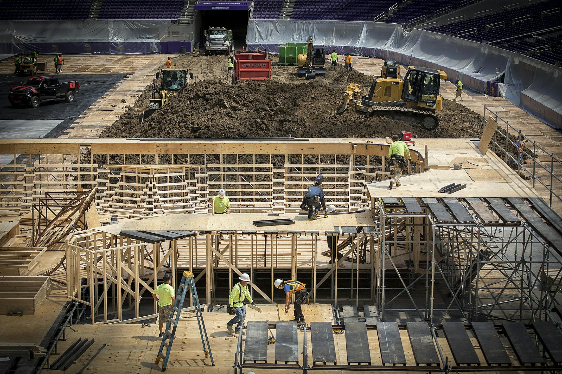 Construction crew worked on assembling different courses for the upcoming X Games that will be held in the US Bank Stadium, Friday, June 30, 2017 in Minneapolis, MN.