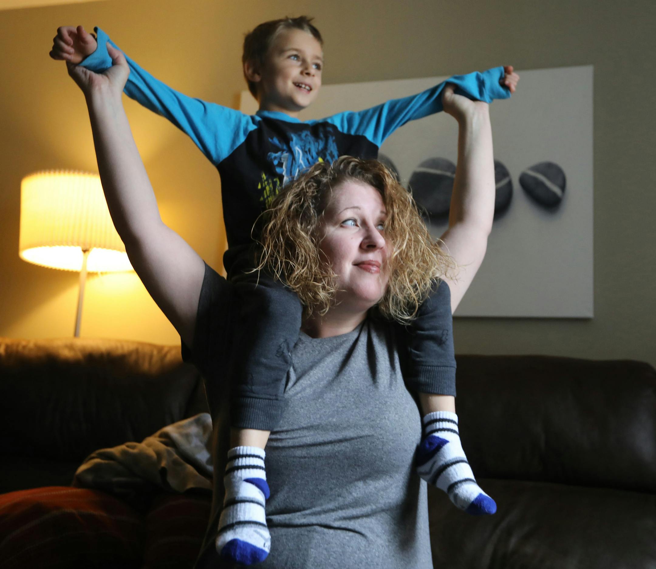 Nichole and Matthew Lowther play in their living room. Nichole wasn't diagnosed with autism until her son Matthew, now 6, was diagnosed a few years ago. (David Swanson/Philadelphia Inquirer/TNS)