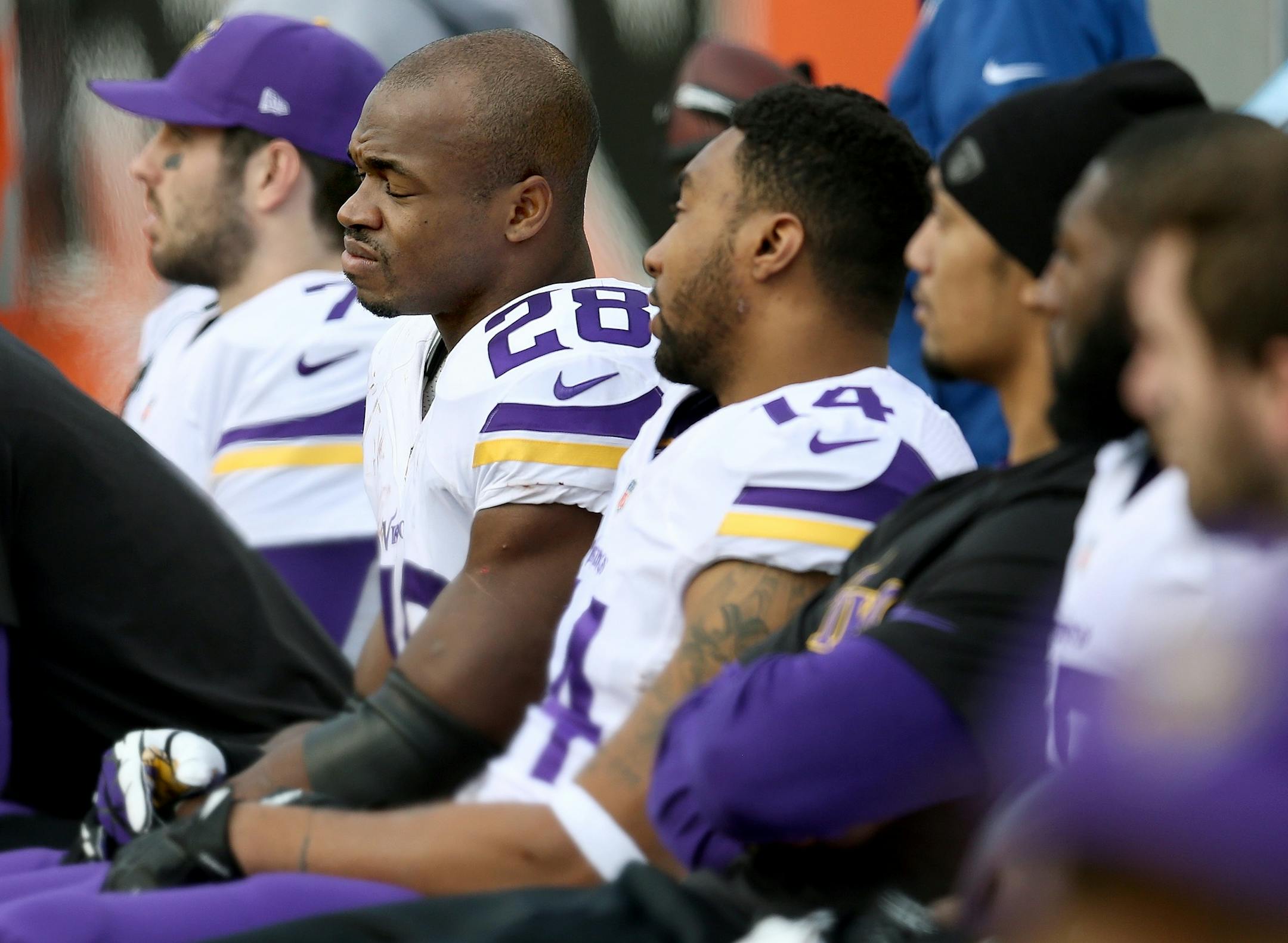 Minnesota Vikings running back Adrian Peterson (28) grimaced from the bench during the fourth quarter as the Minnesota Vikings took on the Cincinnati Bengals at Paul Brown Stadium in Cincinnati, OH, Sunday, December 22, 2013. ELIZABETH FLORES/STAR TRIBUNE) ELIZABETH FLORES � eflores@startribune.com