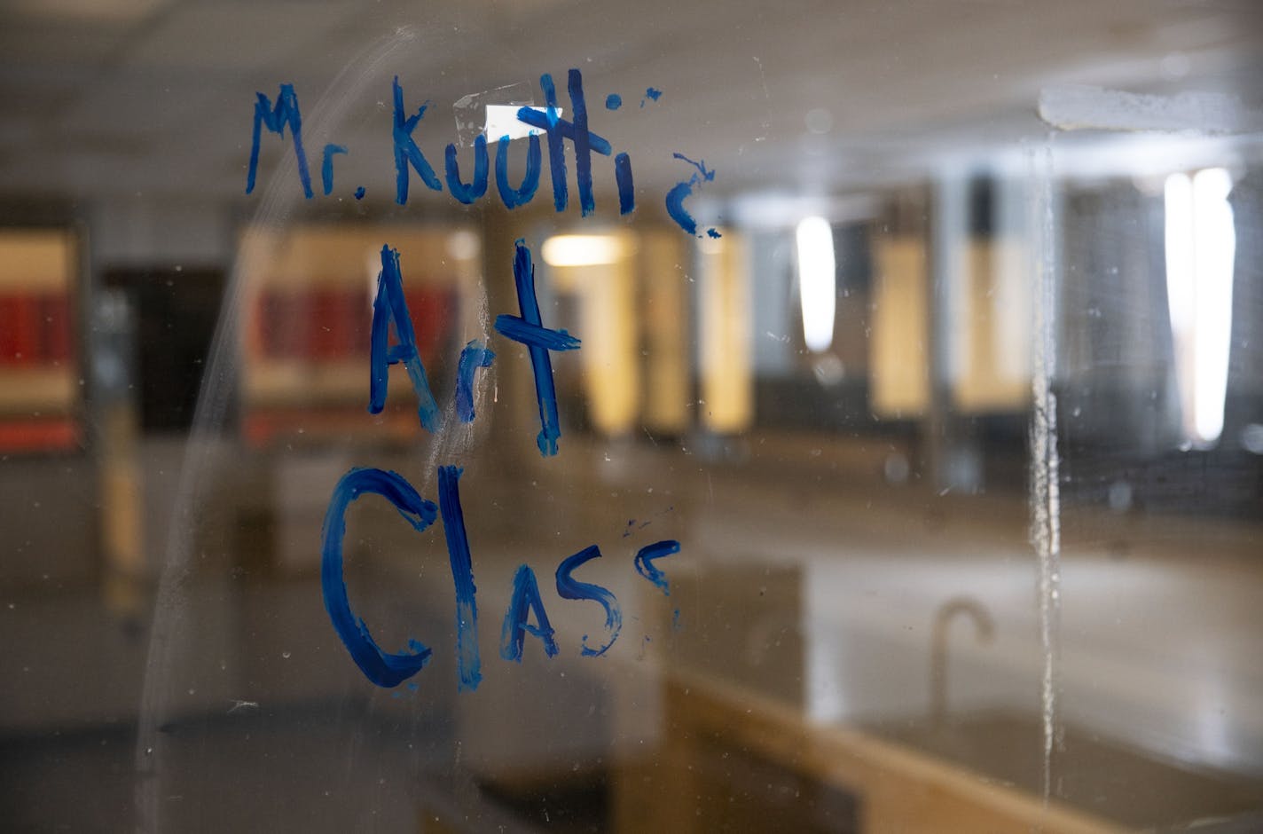 The words " Mr. Kuuttiz Art Class" remained painted on a window in the former art classroom in Duluth Central High School on Thursday March 5, 2020. The district now plans start to the academic year with distance learning for middle and high school students.