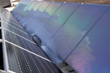 Reflective backs on solar arrays reflected the suns rays. President and Founder of tenKsolar, Dallas Meyer, talked about how how the tenKsolar company