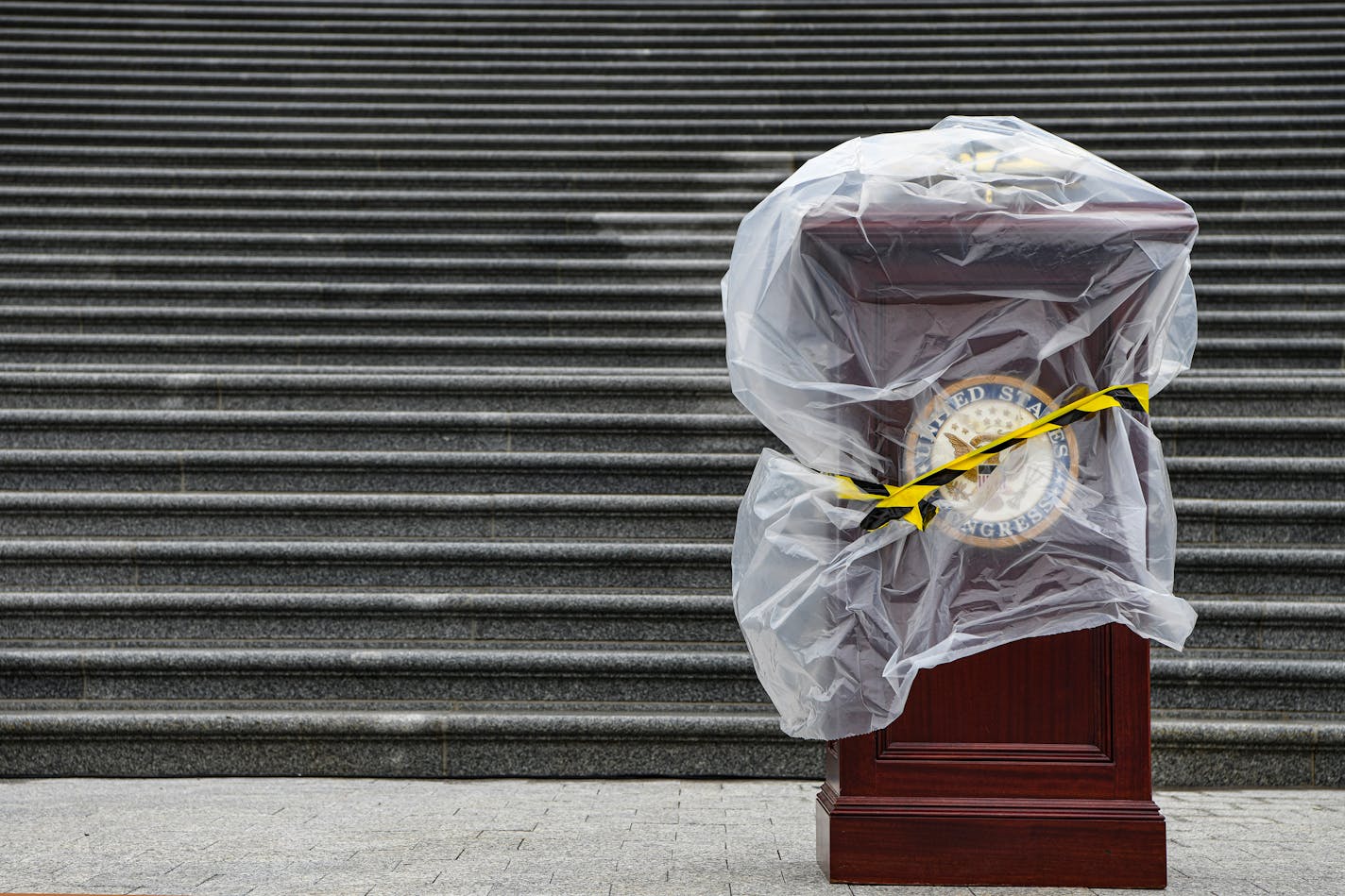 FILE — A podium is set up before a news conference on the steps of the U.S. Capitol in Washington, May 13, 2022. "What Republicans are offering, if they win the 2022 elections, is not conservatism,"writes the New York Times columnist Ezra Klein. "It is crisis." (Kenny Holston/The New York Times)