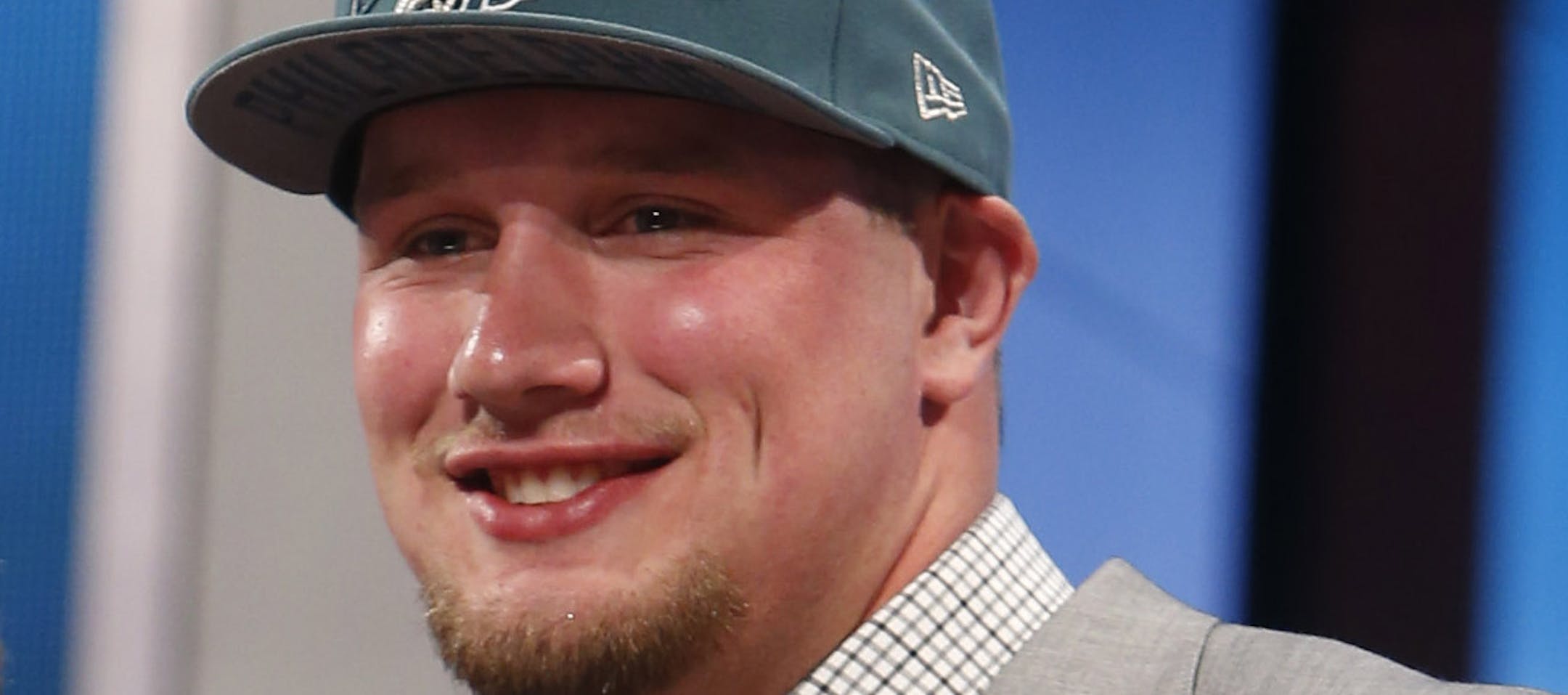 Tackle Lane Johnson from Oklahoma stands with NFL commissioner Roger Goodell after being selected fourth overall by the Philadelphia Eagles in the first round of the NFL football draft, Thursday, April 25, 2013 at Radio City Music Hall in New York. (AP Photo/Jason DeCrow)