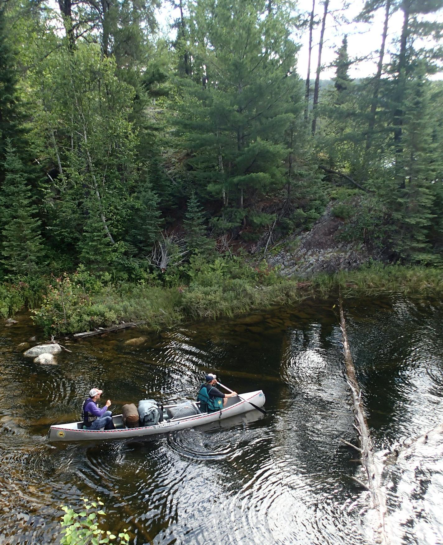 Greg Swenson and Erik Skafte paddle a remove lake in Quetico Provincial Park. Star Tibune photo by Doug Smith