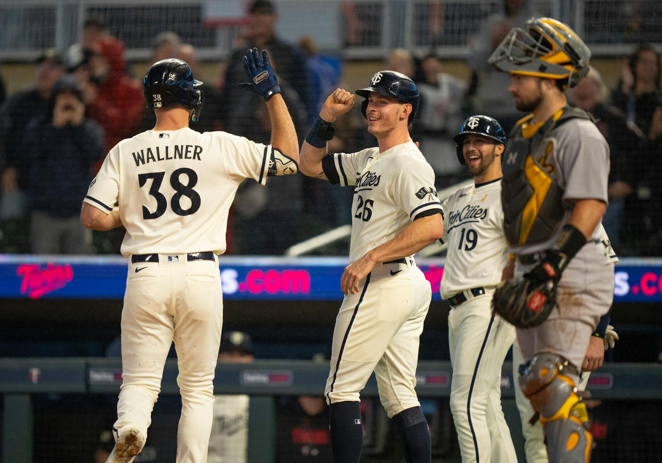 Minnesota Twins left fielder Matt Wallner was greeted at home by Twins right fielder Max Kepler (26) and first baseman Alex Kirilloff (19) after he hit a grand slam in the first inning. The Minnesota Twins faced the Oakland Athletics in an MLB baseball game Tuesday night, September 26, 2023 at Target Field in Minneapolis. ] JEFF WHEELER • jeff.wheeler@startribune.com