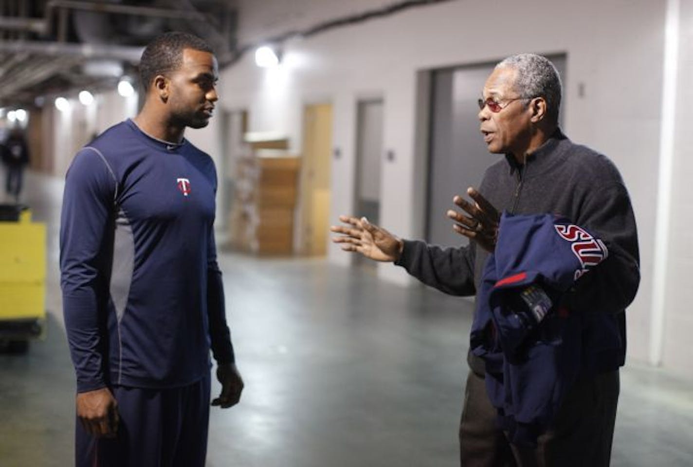 Twins center fielder and leadoff hitter Denard Span, left, listened as Hall of Famer Rod Carew gave some advice in a corridor at Target Field.