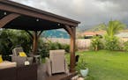 This July 2023 image provided by Amy Chadwick shows the backyard of her home in Lahaina, on the Hawaiian island of Maui.