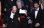 Jordan Horowitz, producer of "La La Land," shows the envelope revealing "Moonlight" as the true winner of best picture at the Oscars on Sunday, Feb. 2
