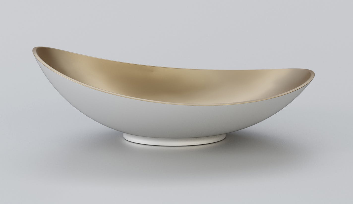 Kallista Myam Sink, Photo courtesy of Kallista.com.
The beautiful curve of this Kallista Myam bathroom sink rolls like the incoming tide and the matte white surface is so fresh that we could design an entire home starting with this piece.