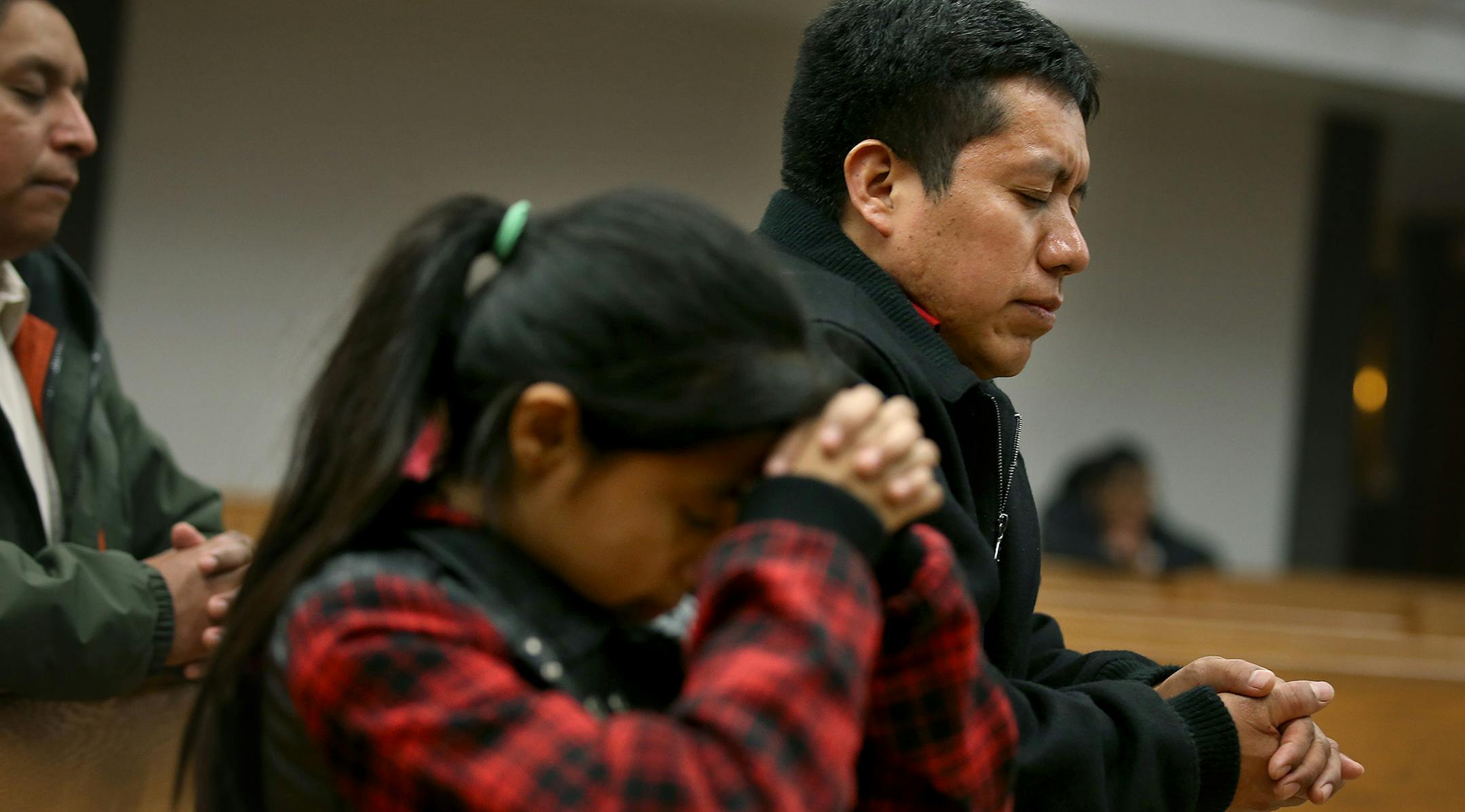 Jacobo Gabriel-Tomas said that his church St. Mary's Catholic Church, has been a great support system , as he prayed with his daughter Beatriz, Tuesday, December 09, 2014 in Worthington, MN. ] (ELIZABETH FLORES/STAR TRIBUNE) ELIZABETH FLORES • eflores@startribune.com