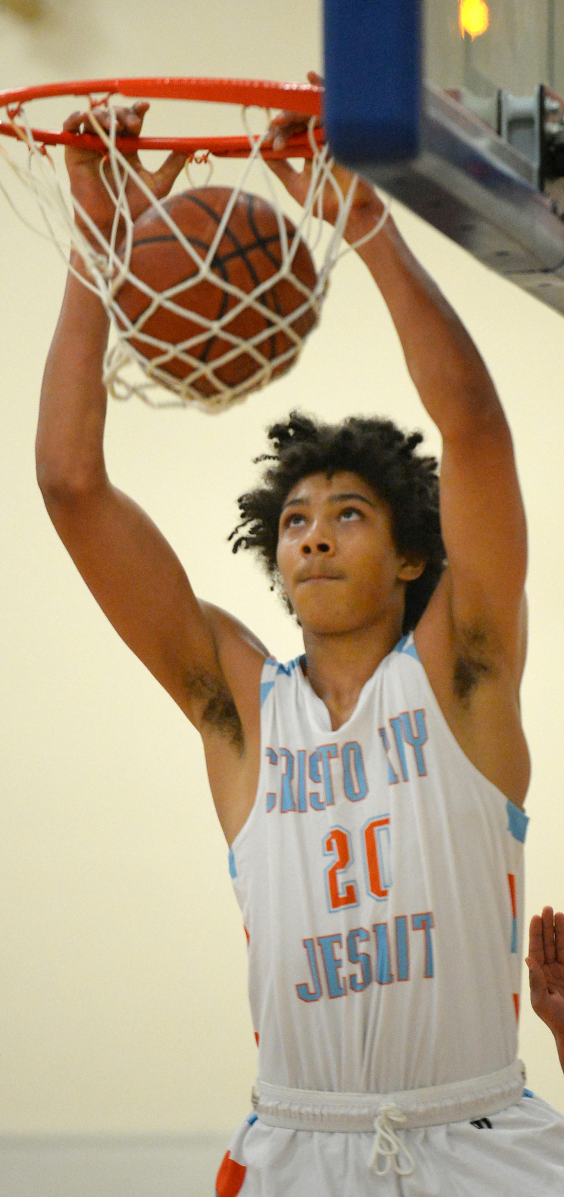 Cristo Rey High School's Jericho Sims dunked the ball against Math & Science Academy Tuesday night in the first half. ] (AARON LAVINSKY/STAR TRIBUNE) aaron.lavinsky@startribune.com West zone feature on Cristo Rey High School basketball player Jericho Sims, rising star at a school not accustomed to prep basketball acclaim. We photograph a game at Math & Science Academy on Tuesday, Jan. 26, 2016 in Woodbury.