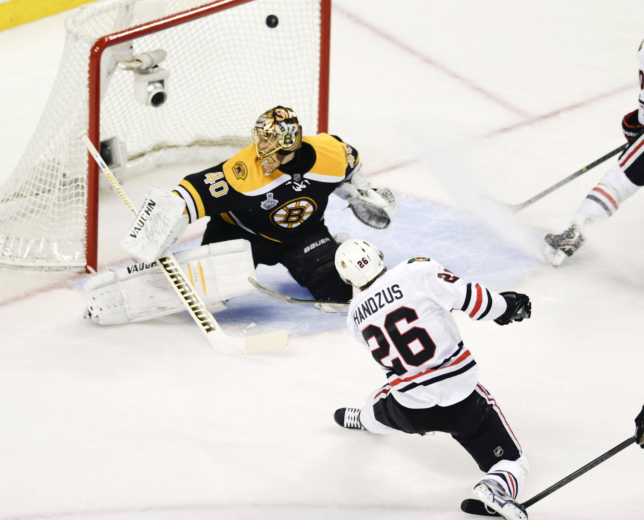 Blackhawks center Michal Handzus scored past Bruins goalie Tuukka Rask during the first period in Game 4 in the Stanley Cup Finals on Wednesday in Boston.