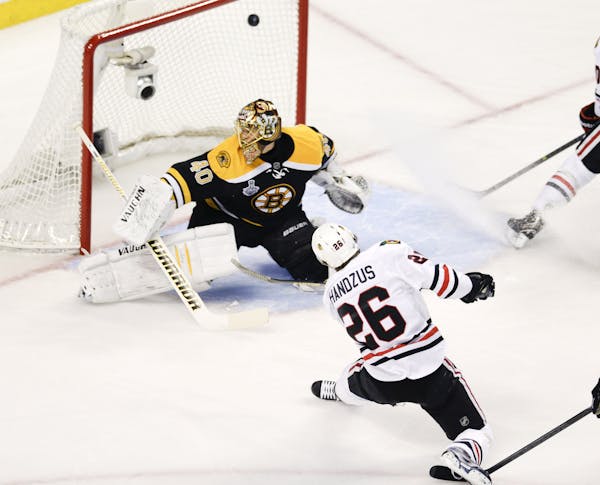 Blackhawks center Michal Handzus scored past Bruins goalie Tuukka Rask during the first period in Game 4 in the Stanley Cup Finals on Wednesday in Bos