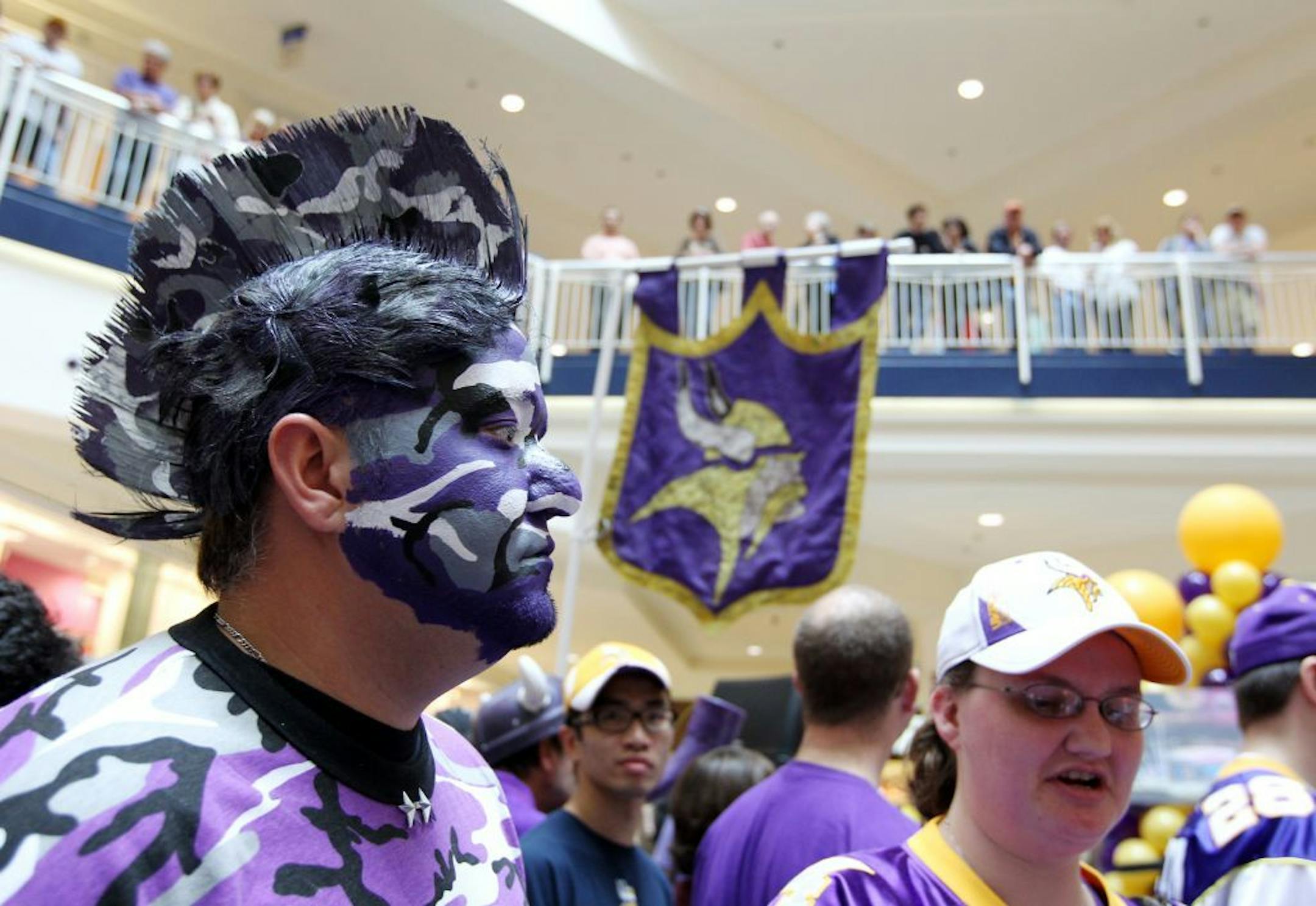 Viking World Order officer Josh Lynch, left, of Redwing came to offer his support at a rally for The Minnesota Vikings stadium at the Mall of America in Bloomington May 5, 2012.