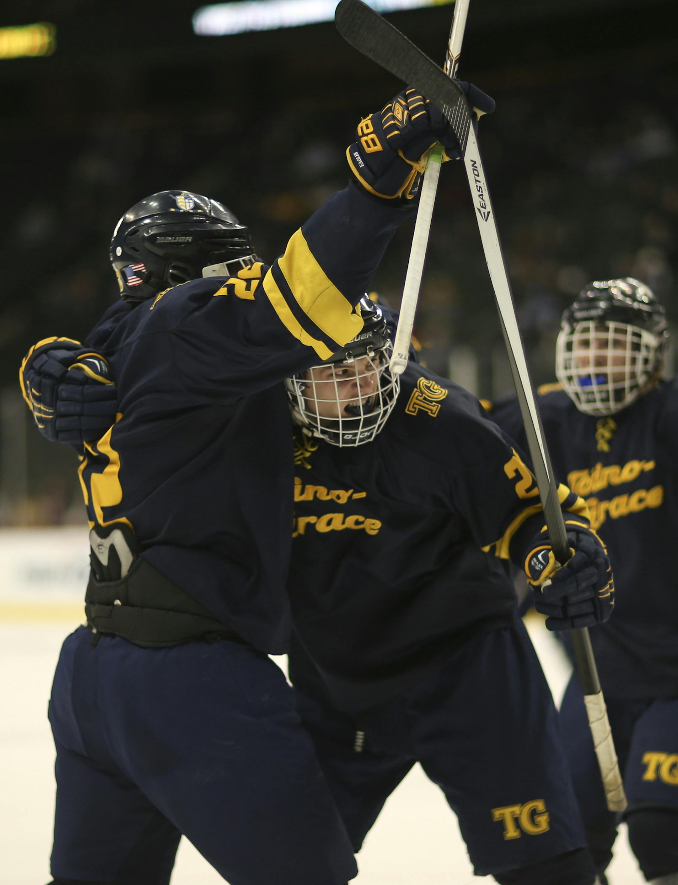 Totino-Grace forward Blake Vagle, rear, celebrated his first period goal with forward Kai Barber, left. ] JEFF WHEELER ‚Ä¢ jeff.wheeler@startribune.com Totino-Grace faced St. Cloud Cathedral in a quarterfinal round game in the Class A boys' state high school hockey tournament Wednesday night, March 5, 2014 at Xcel Energy Center in St. Paul.