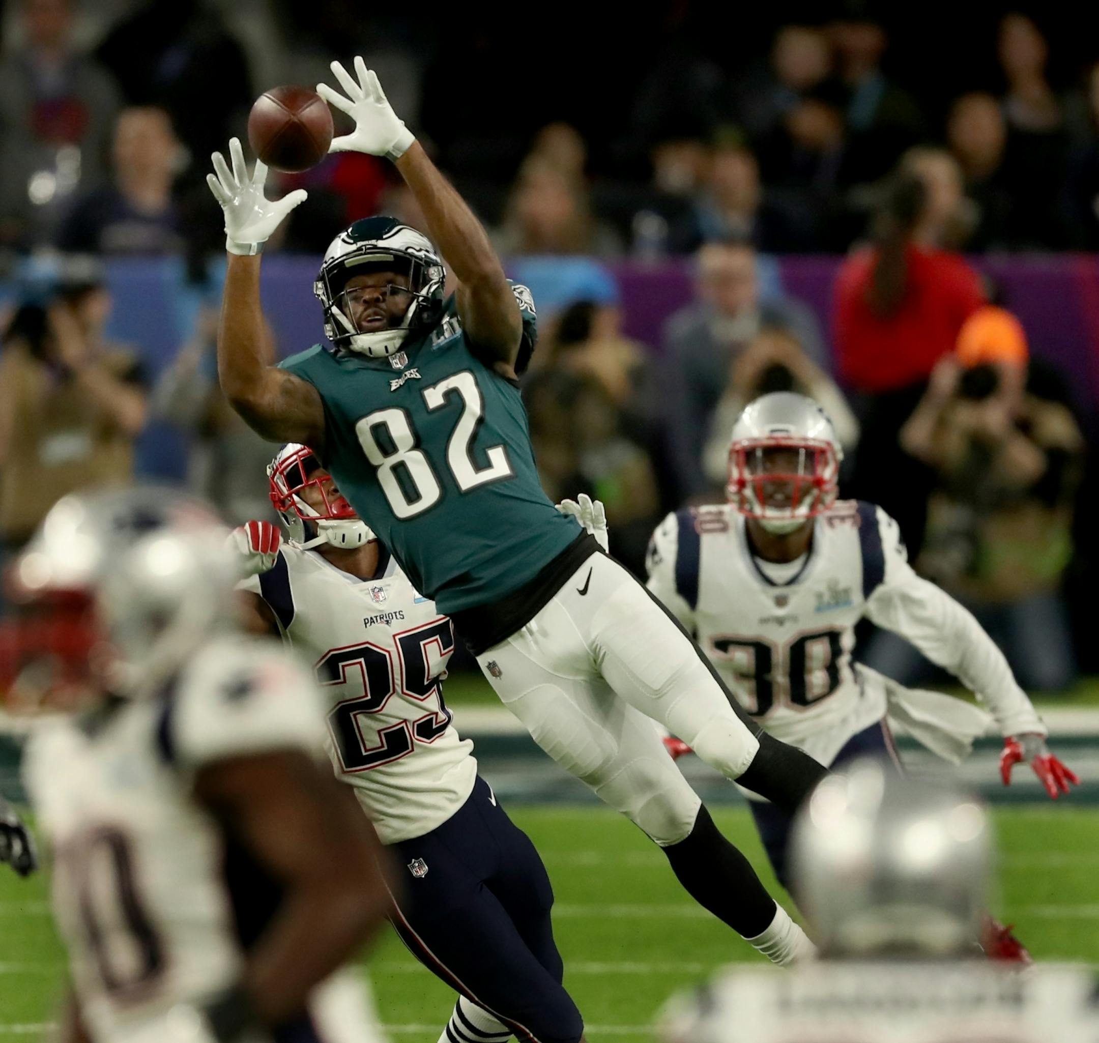 Philadelphia Eagles wide receiver Torrey Smith (82) stretched to make a catch during the team's opening drive in Super Bowl LII.