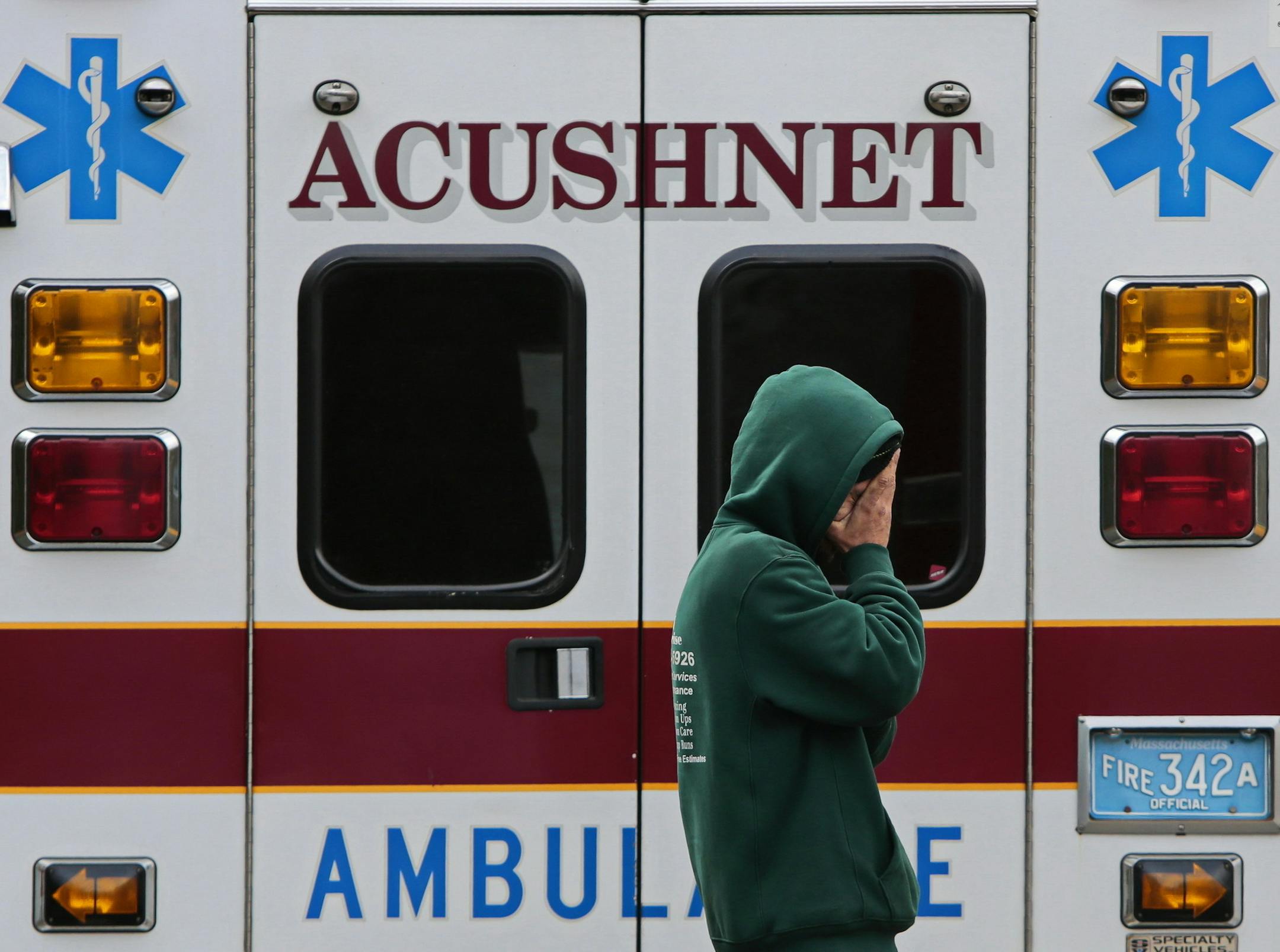 Timothy Souza is overcome with emotion after learning that his cousin Joseph Lopes, 41, and his cousins son Collin Lopes, 9, were found dead in a home in Acushnet, Mass., Wednesday, Dec. 7, 2016. Officials say carbon monoxide poisoning is suspected in the deaths. (Peter Pereira/Standard Times via AP)