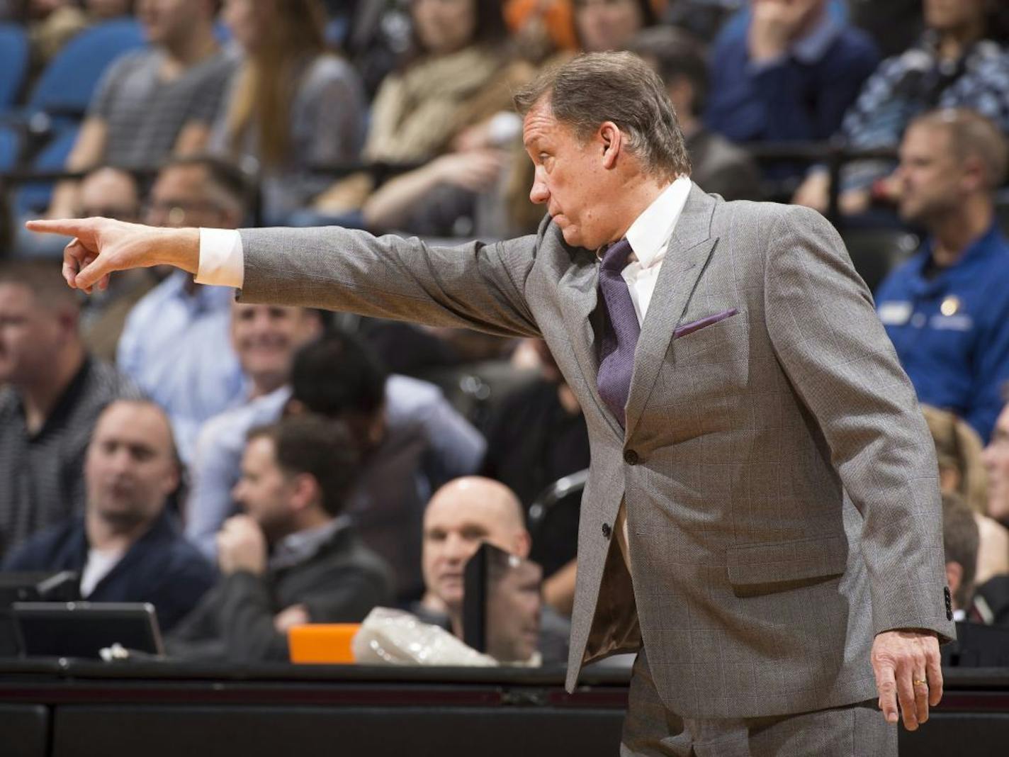 Minnesota Timberwolves head coach Flip Saunders directs the team toward the end of the fourth quarter.