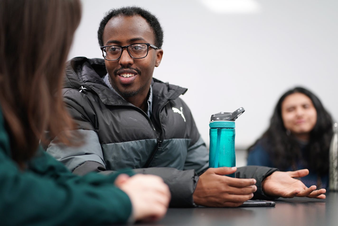 Zakariya Abdullahi talked with a fellow classmate as they waited for a holiday potluck on a campus to begin. ] ANTHONY SOUFFLE &#x2022; anthony.souffle@startribune.com Zakariya Abdullahi, a Somali-American student at Augsburg University, met with fellow students to study together for a math class in one of the Hagfors Center's group study areas Wednesday, Nov. 28, 2018 in MinneapolisMore students of color than white students attend Augsburg University this fall - a demographic shift virtually un