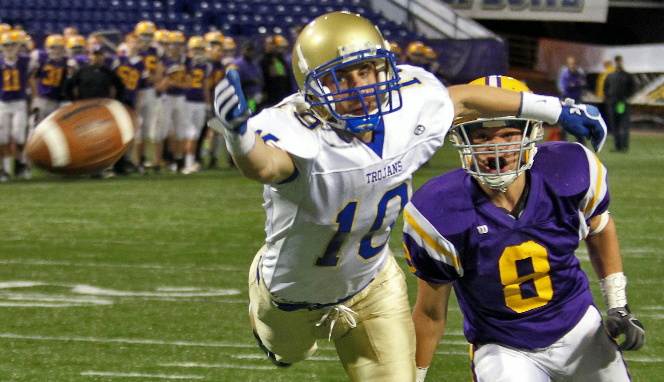 Wayzata's Ethan Zeider (10) just missed a reception in the end zone as Cretin-Derham Hall's Blake Banham defended.