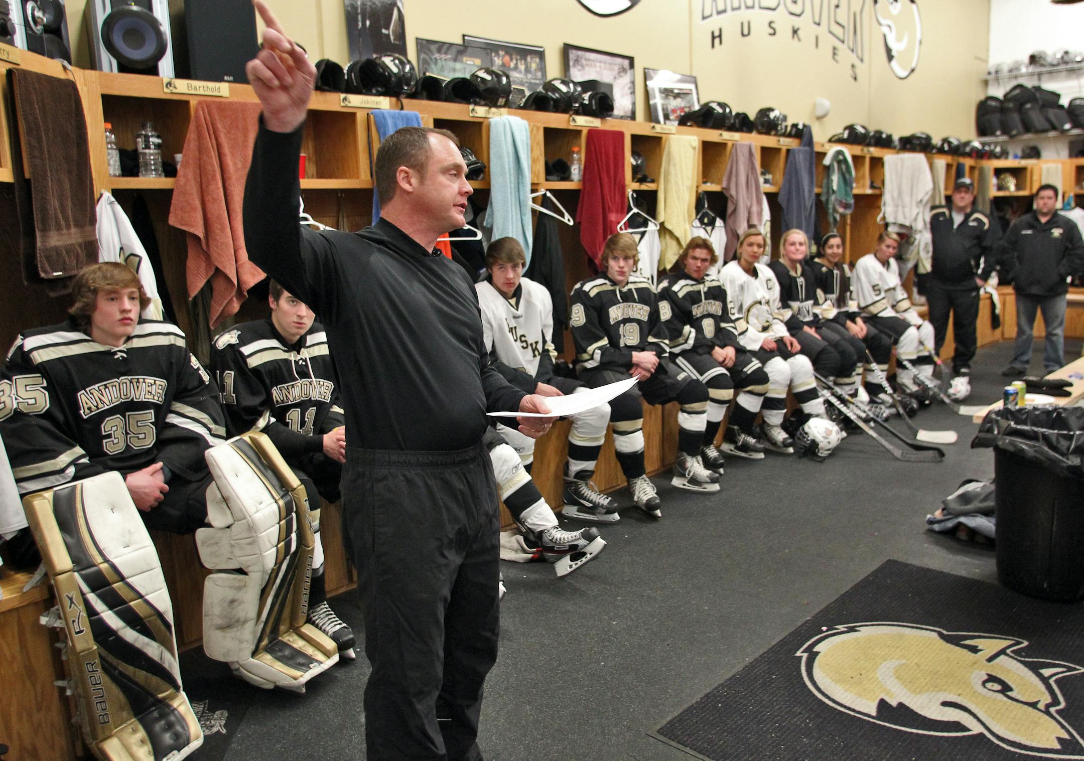 The Minnesota High School Athletic Association will announce stricter rules and penalties for hockey players who are called for checking a player in the back or sending players flying into the boards of a rink. Officials conducted a video session with Andover hockey players to demonstrate the change in rules. Craig Perry, associate director of the high school league, went over the rule changes with players from both the girls and boys Andover hockey team. ](MARLIN LEVISON/STARTRIBUNE(mlevison@st