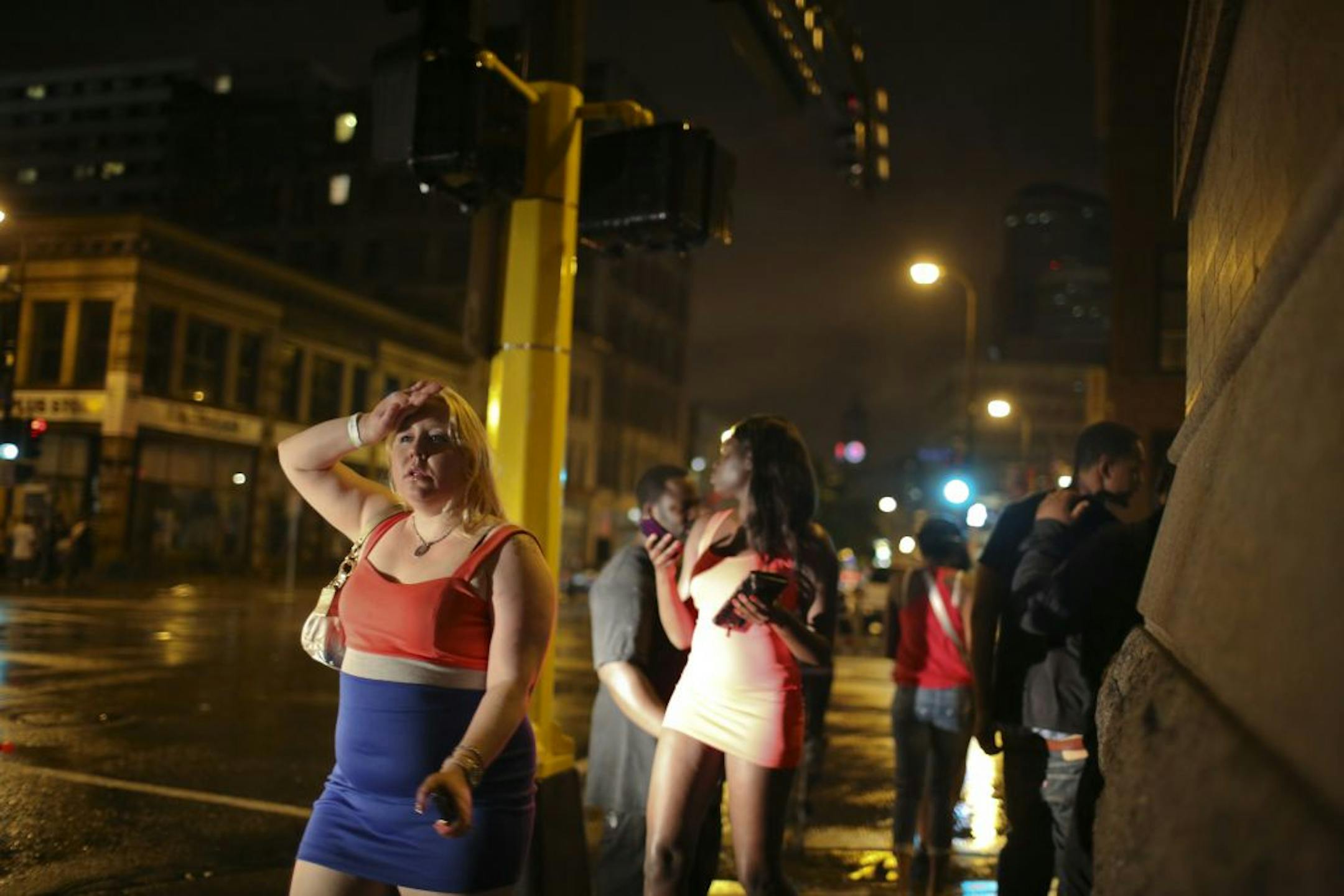 Minneapolis Police are saying that the crowds early Monday morning when the bars close at 2 a.m. are increasingly a problem at the intersection of First Ave. N. and 4th St. N. The scene outside Club Envy shortly after 2 a.m. Monday morning, May 28, 2012 as club goers dispersed into the rainy night.