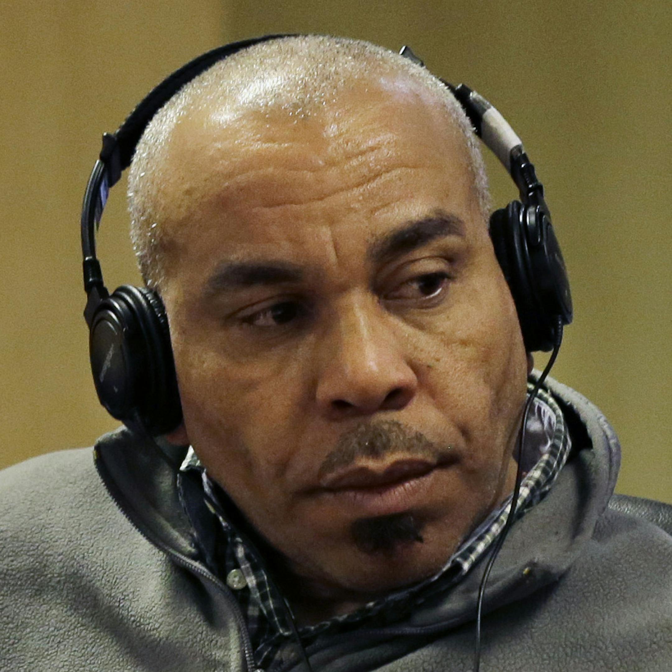 Pedro Quezada the New Jersey man who just won a $338 million Powerball jackpot, listens to an interpreter during his appearance in state Superior Court in Paterson, N.J., Monday, April 1, 2013. Authorities had said the 44-year-old Passaic resident owed about $29,000 in back support for three of his five children. During the court hearing, officials said Quezada had paid $30,000 to settle the debt. He also told the judge in Spanish that the three children would now be living with him. (AP Photo/M