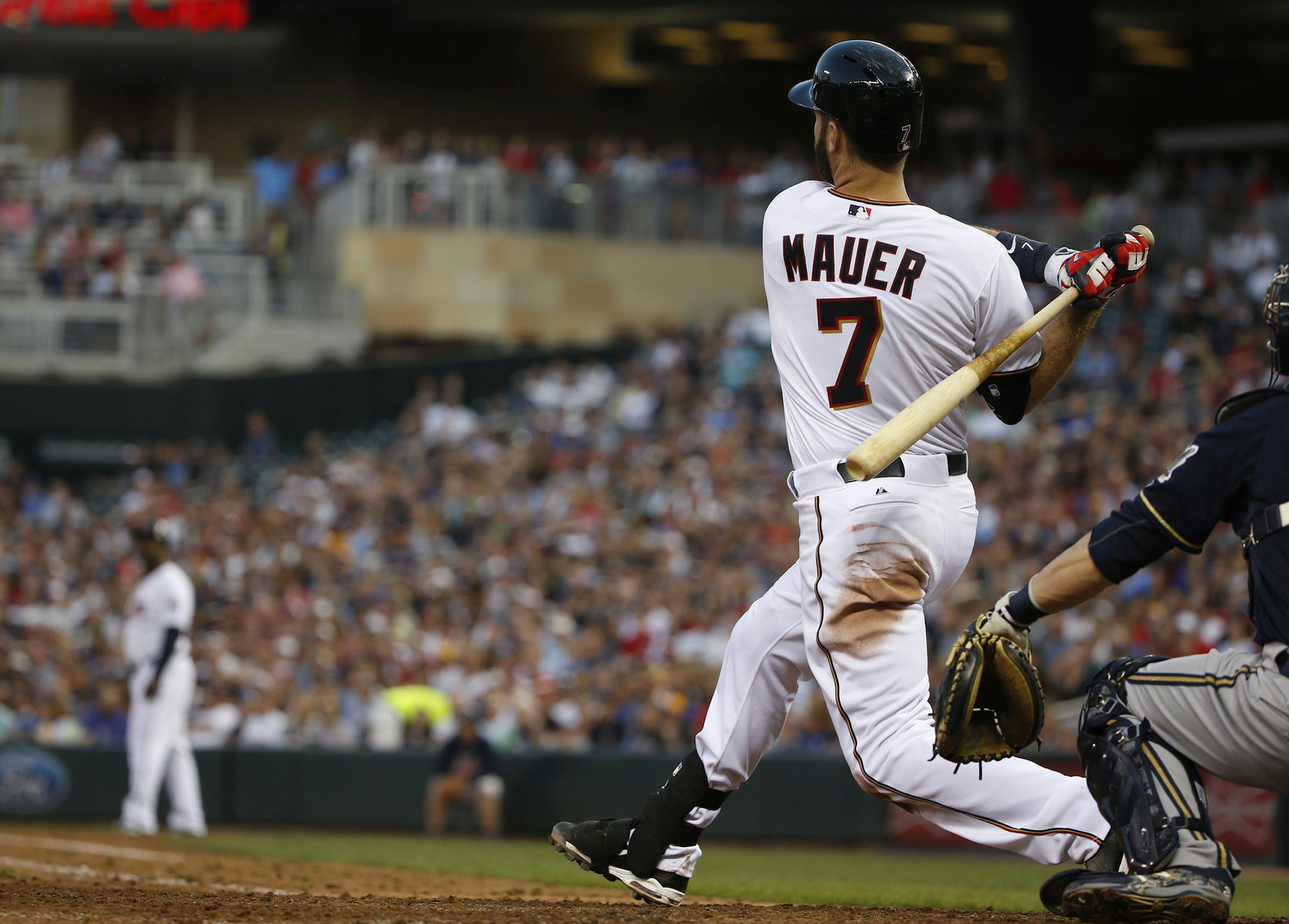 Joe Mauer #7 of the Minnesota Twins hit a three run home run to tie the game 5-5 in the fifth inning.